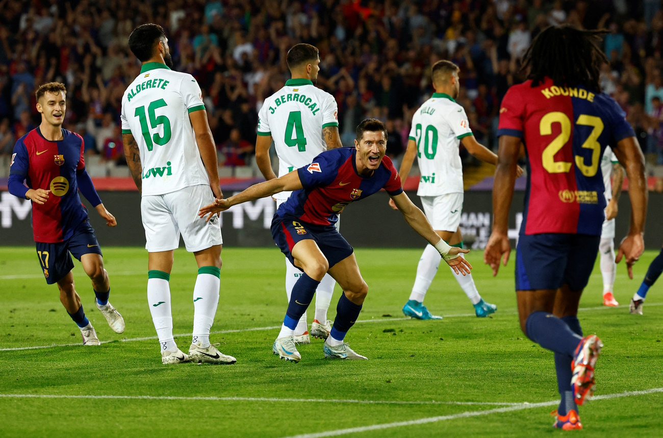 Soccer Football - LaLiga - FC Barcelona v Getafe - Estadi Olimpic Lluis Companys, Barcelona, Spain - September 25, 2024 FC Barcelona's Robert Lewandowski celebrates scoring their first goal REUTERS