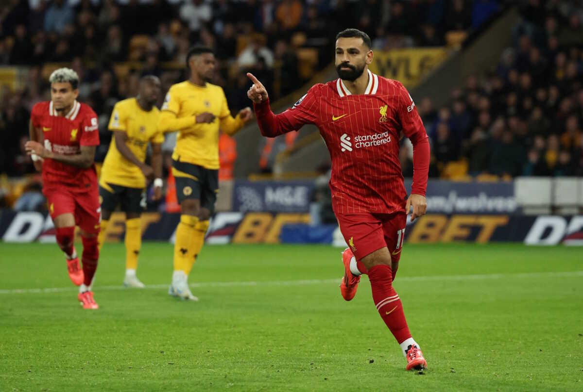 Soccer Football - Premier League - Wolverhampton Wanderers v Liverpool - Molineux Stadium, Wolverhampton, Britain - September 28, 2024 Liverpool's Mohamed Salah celebrates scoring their second goal REUTERS