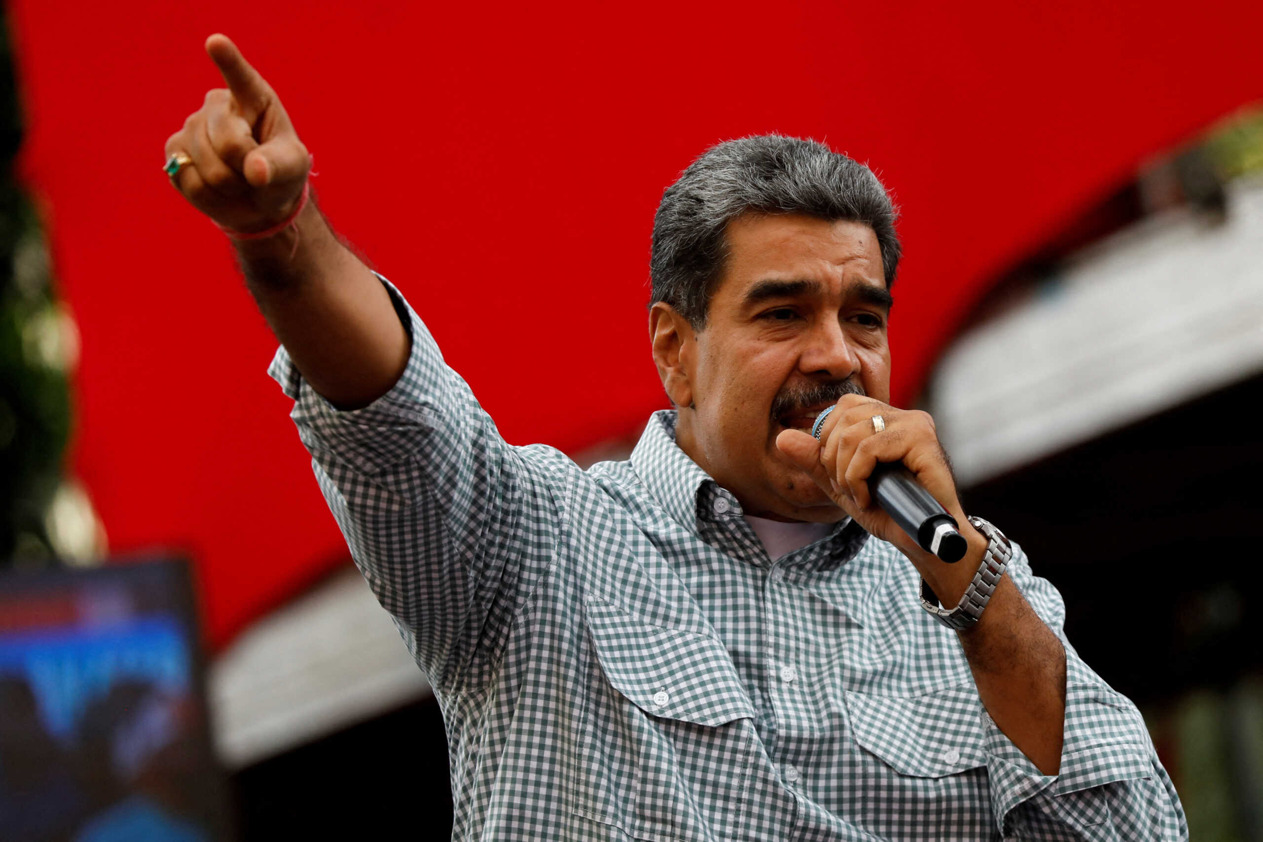 FILE PHOTO: Venezuelan President Nicolas Maduro delivers a speech during a rally to celebrate the results of last month's presidential election, in Caracas, Venezuela August 28, 2024. REUTERS