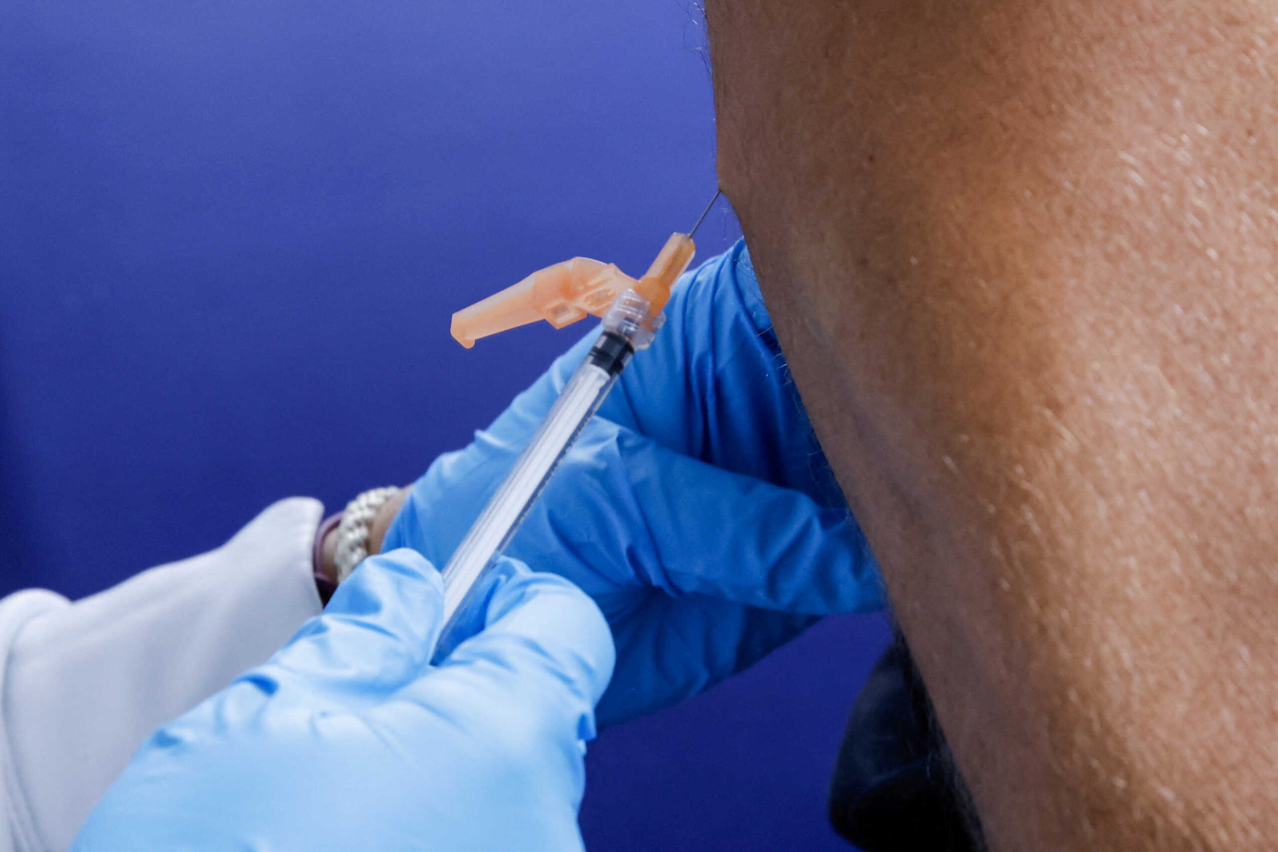 FILE PHOTO: A person receives an mpox vaccination at the Northwell Health Immediate Care Center at Fire Island-Cherry Grove, in New York, U.S., July 15, 2022. REUTERS