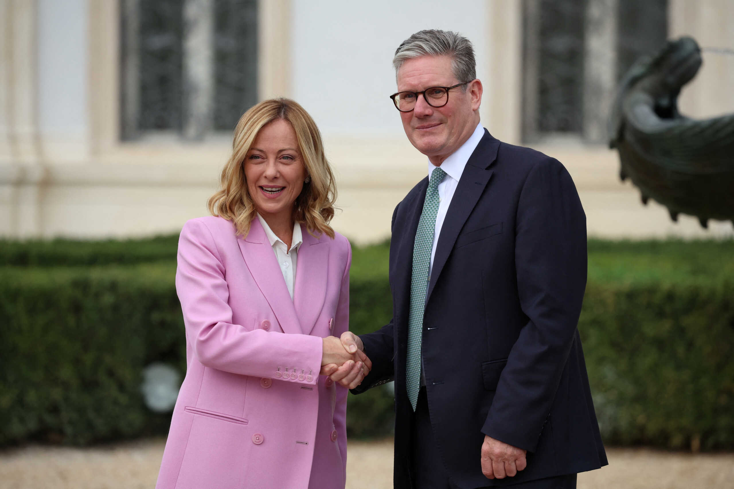 Italian Prime Minister Giorgia Meloni and British Prime Minister Keir Starmer shake hands as they meet at Villa Doria Pamphilj in Rome, Italy, September 16, 2024. REUTERS