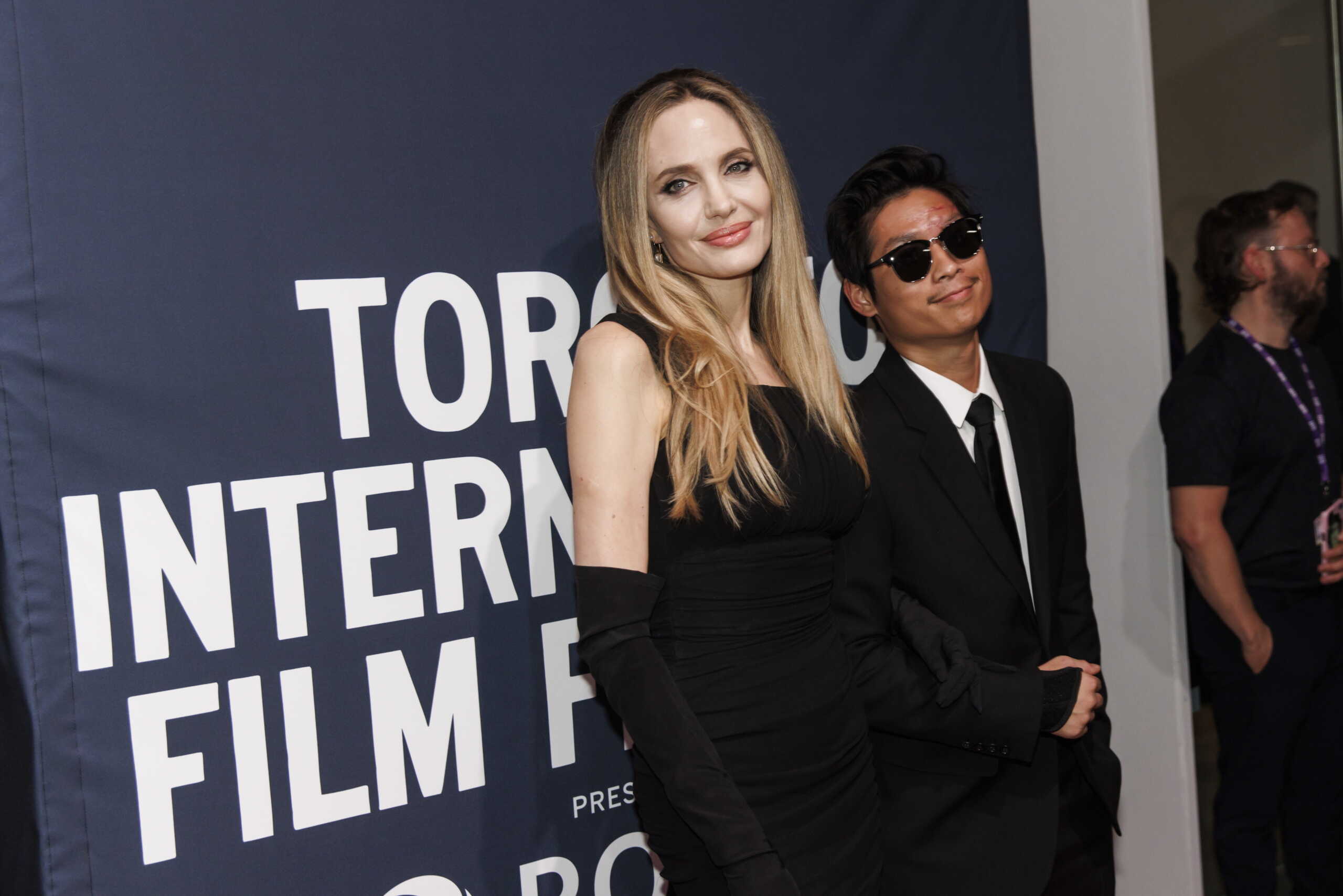 Angelina Jolie and Pax Jolie-Pitt arrive on the red carpet for the premiere of "Without Blood" at TIFF Lightbox during the Toronto International Film Festival in Toronto, Sunday, Sept. 8, 2024. (Cole Burston