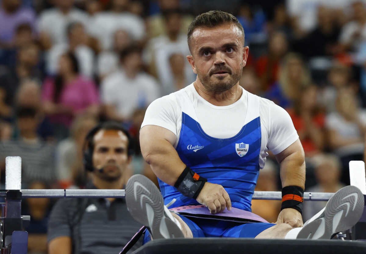 Paris 2024 Paralympics - Powerlifting - Men's up to 54kg Final - Porte de La Chapelle Arena, Paris, France - September 4, 2024 Dimitrios Bakochristos of Greece reacts REUTERS