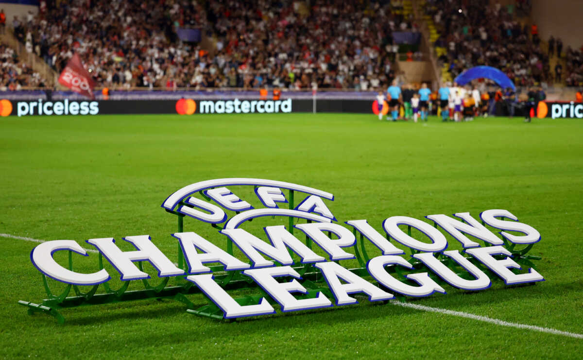 Soccer Football - Champions League - AS Monaco v FC Barcelona - Stade Louis II, Monaco - September 19, 2024 Champions League signage is seen on the pitch before the match REUTERS