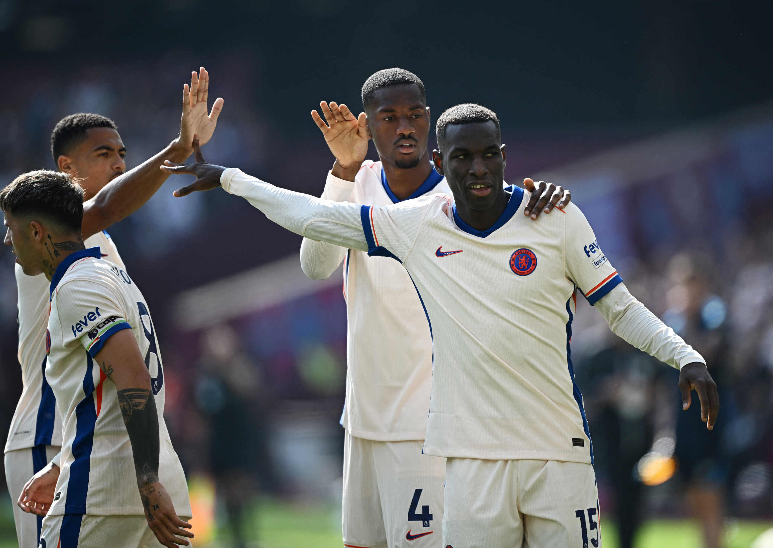 Soccer Football - Premier League - West Ham United v Chelsea - London Stadium, London, Britain - September 21, 2024 Chelsea's Nicolas Jackson celebrates scoring their first goal with Tosin Adarabioyo and Levi Colwill REUTERS