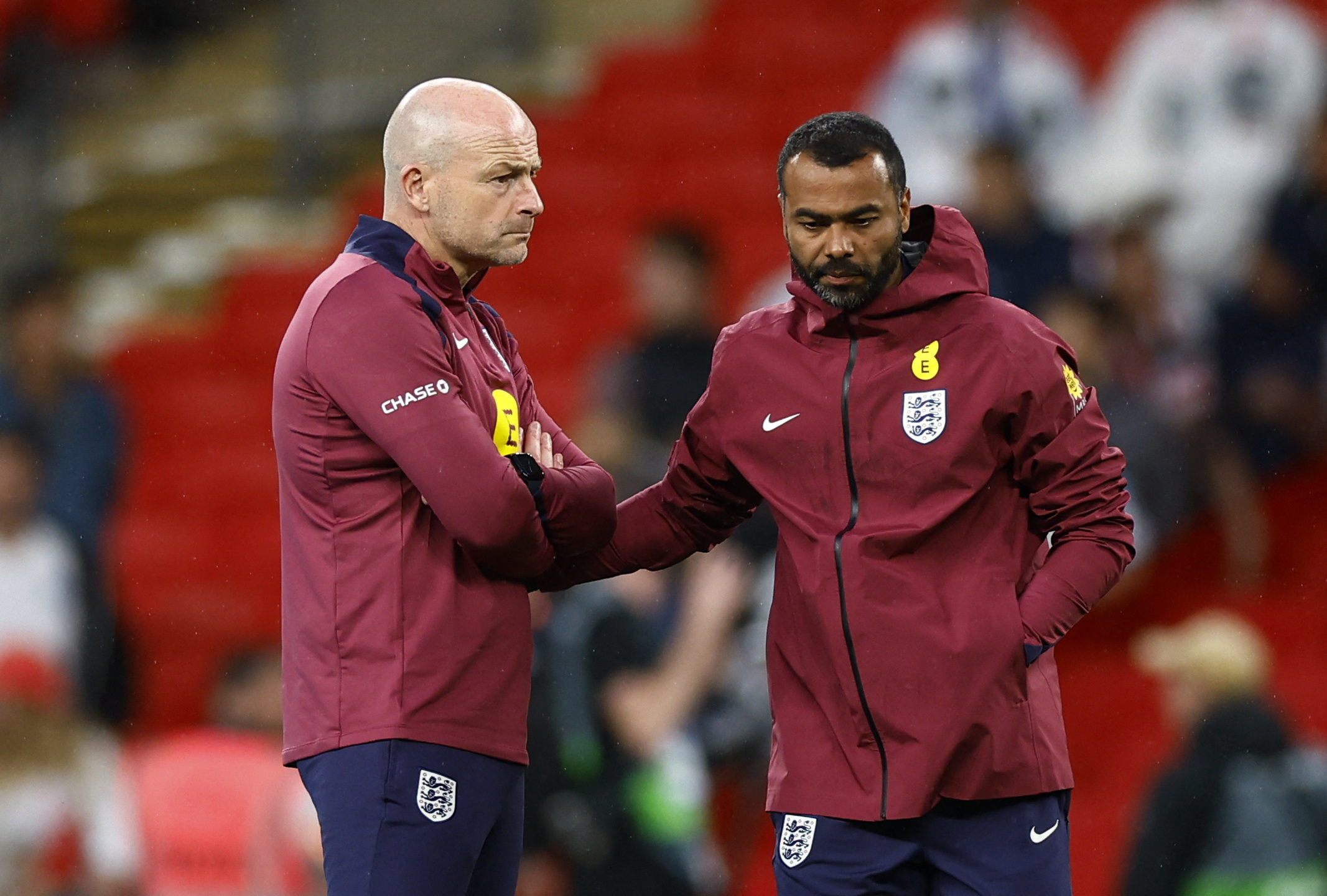 Soccer Football - Nations League - League B - Group 2 - England v Finland - Wembley Stadium, London, Britain - September 10, 2024 England interim manager Lee Carsley and assistant manager Ashley Cole during the warm up before the match Action Images via Reuters
