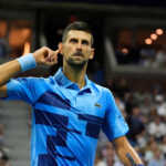 Aug 30, 2024; Flushing, NY, USA;  Novak Djokovic (SRB) works the crowd while playing Alexei Popyrin (AUS) on day five of the 2024 U.S. Open tennis tournament at USTA Billie Jean King National Tennis Center. Mandatory Credit: Robert Deutsch-USA TODAY Sports