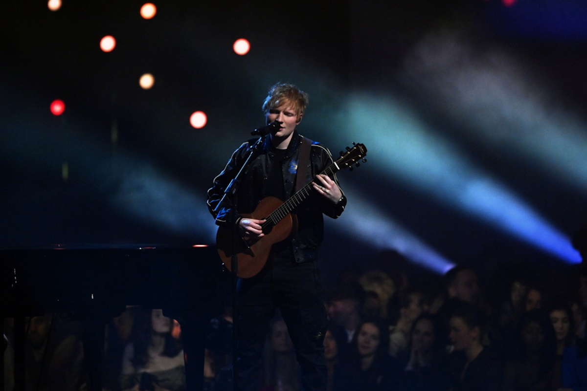 epa09739445 Ed Sheeran performs during the 42nd Brit Awards ceremony at The O2 Arena in London, Britain, 08 February 2022. The annual pop music awards are presented by the British Phonographic Industry (BPI).  EPA