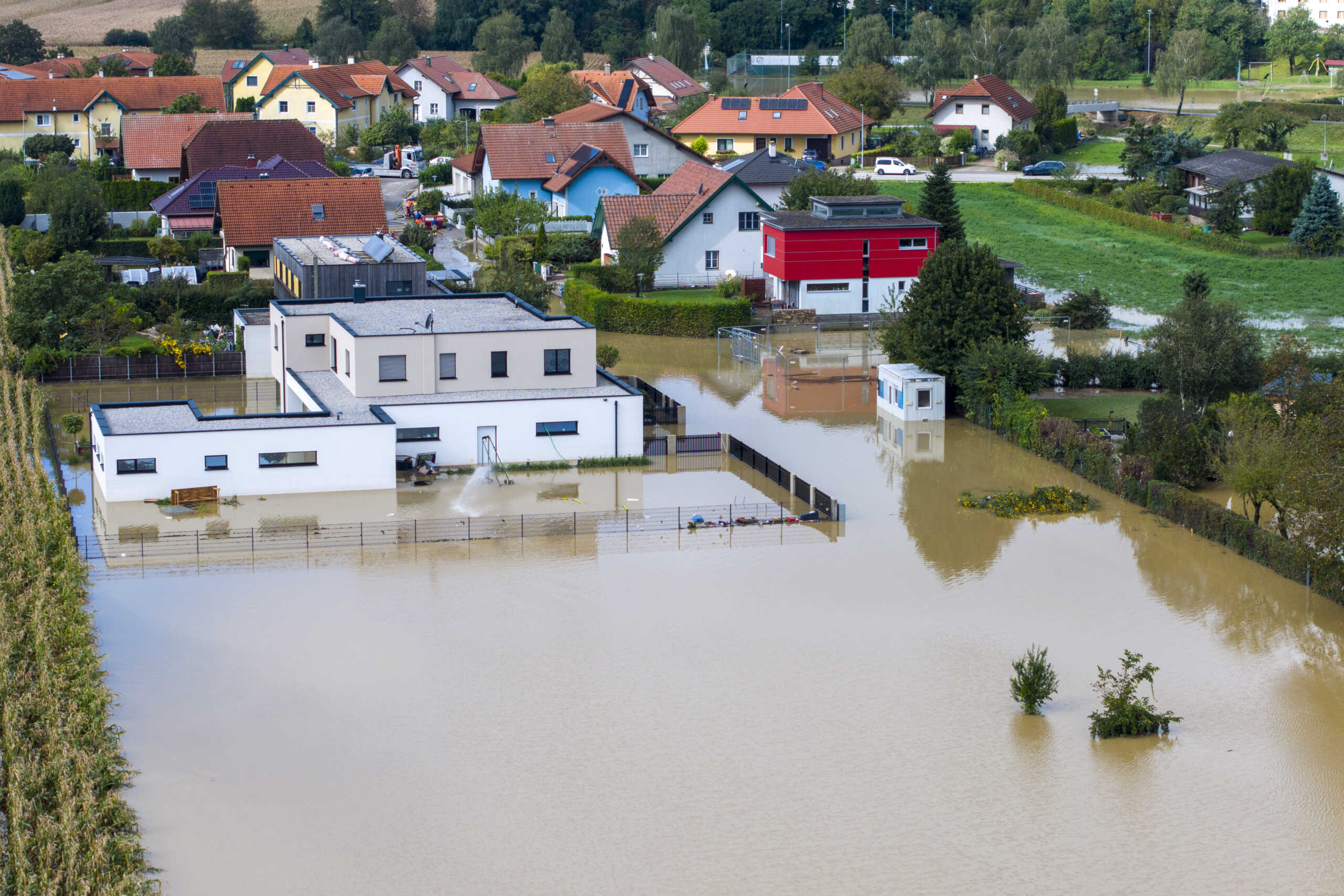 17 September 2024, Austria, Kapelln: In the Lower Austrian town of Kapelln, fields and gardens are under water (aerial photo with a drone). In Austria, the flood waters are receding slightly, but the situation remains tense and there is still a threat of dam breaches and landslides. Photo by: Christoph Reichwein