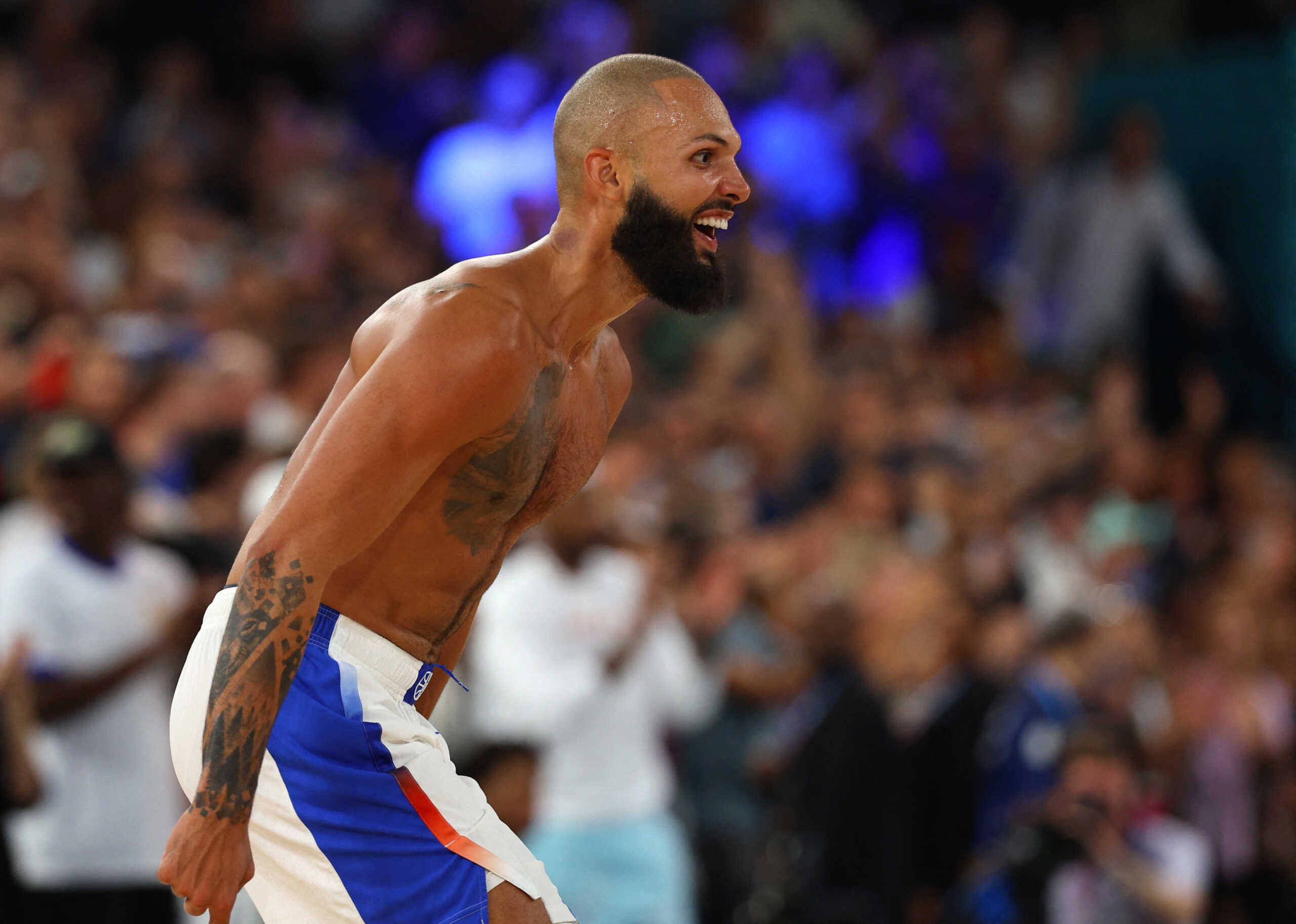 Paris 2024 Olympics - Basketball - Men's Semifinal - France vs Germany - Bercy Arena, Paris, France - August 08, 2024. Evan Fournier of France celebrates after France win the semifinal. REUTERS