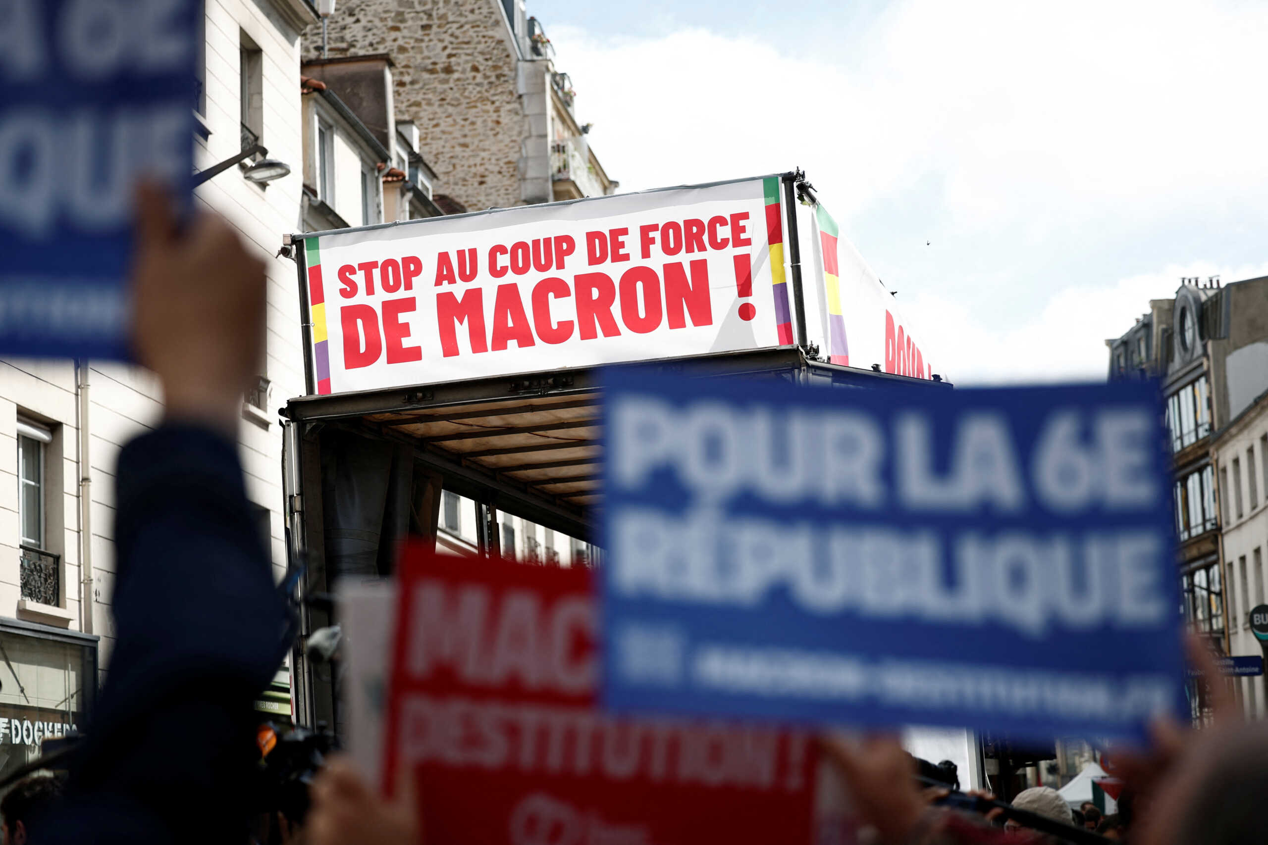 Protesters gather to denounce French President Emmanuel Macron's refusal to name a prime minister from the left-wing New Popular Front coalition, in Paris, France, September 7, 2024. REUTERS
