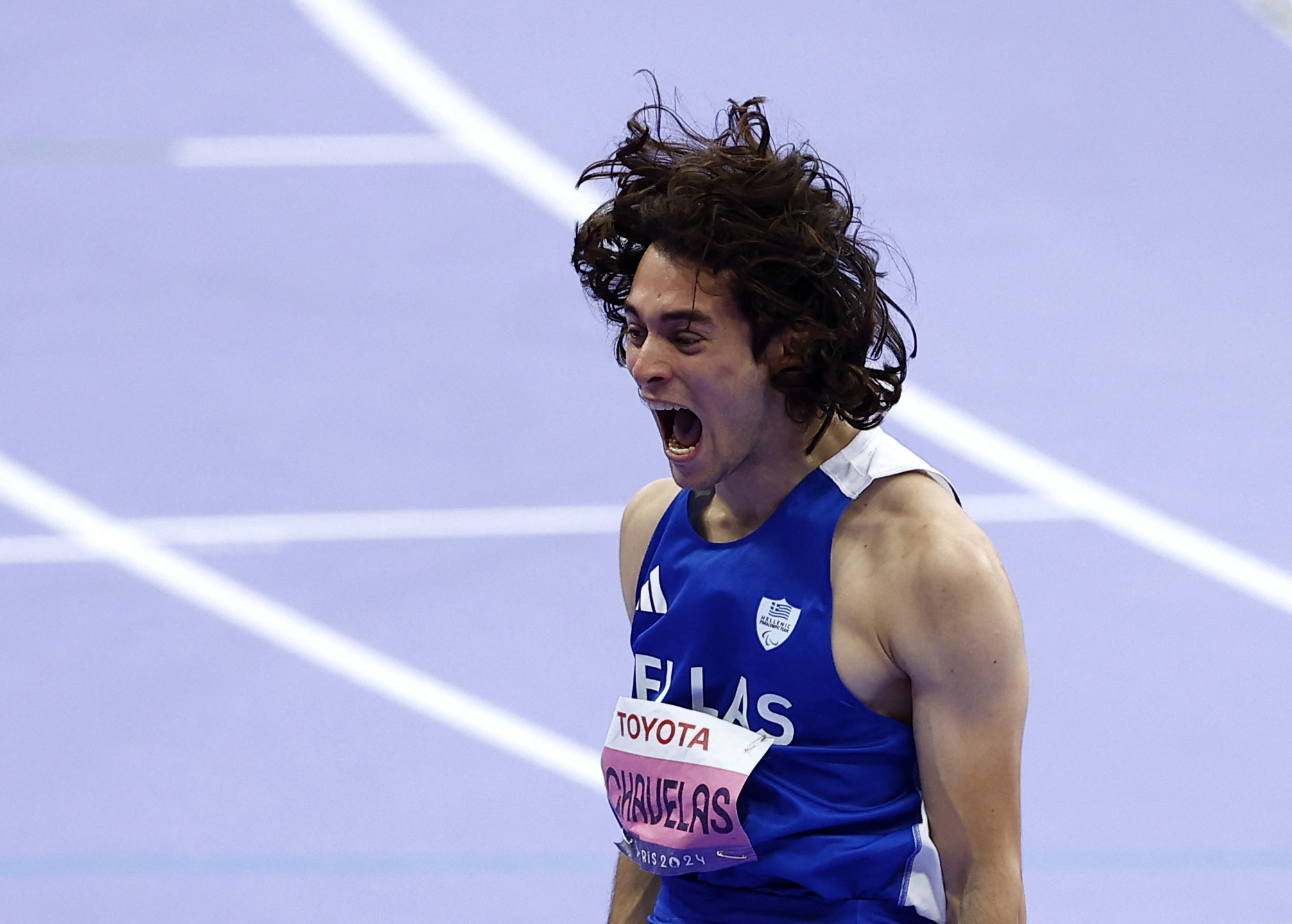 Paris 2024 Paralympics - Athletics - Men's 100m - T11 Final - Stade de France, Saint-Denis, France - September 5, 2024 Athanasios Ghavelas of Greece celebrates after winning gold REUTERS