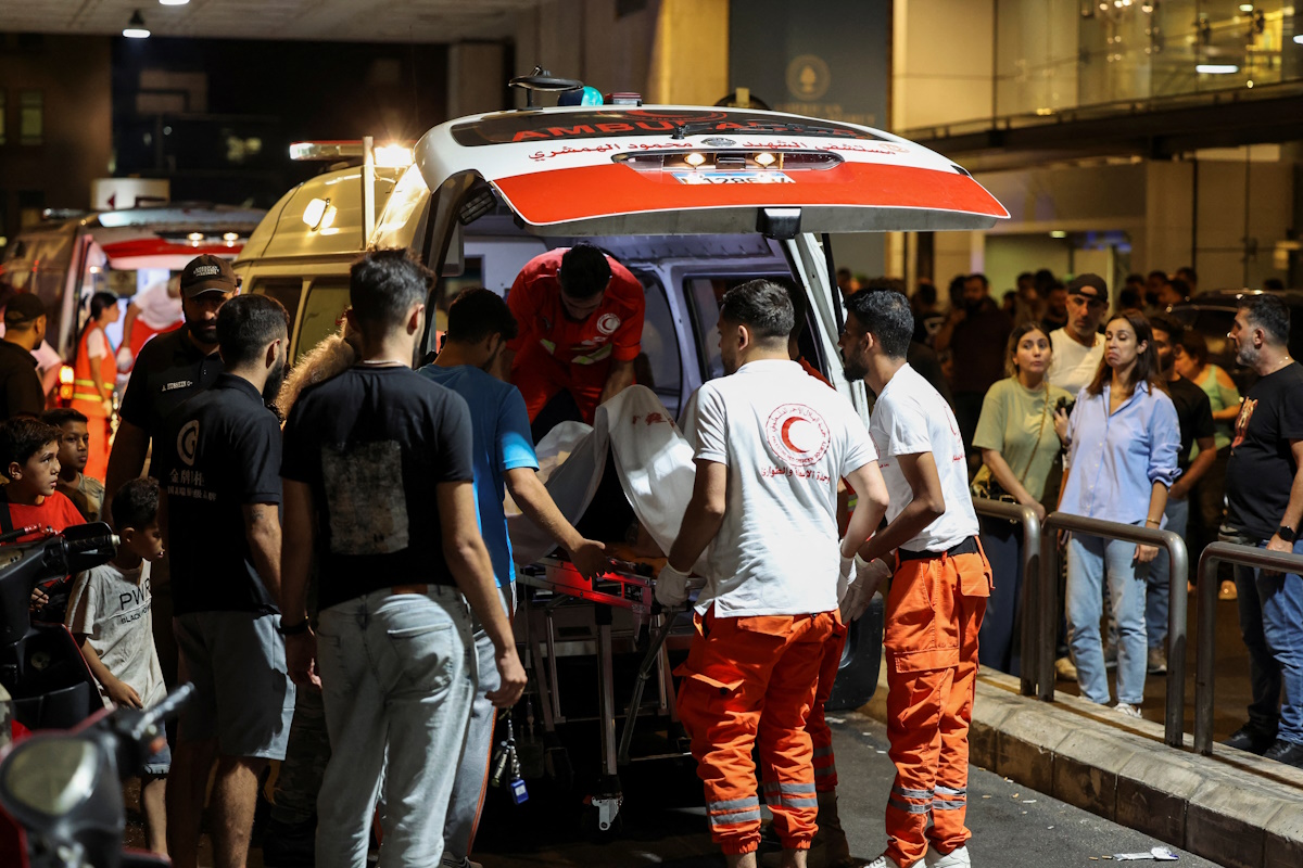 A person is carried on a stretcher outside American University of Beirut Medical Center (AUBMC) as people, including Hezbollah fighters and medics, were wounded and killed when the pagers they use to communicate exploded across Lebanon, according to a security source, in Beirut, Lebanon September 17, 2024. REUTERS