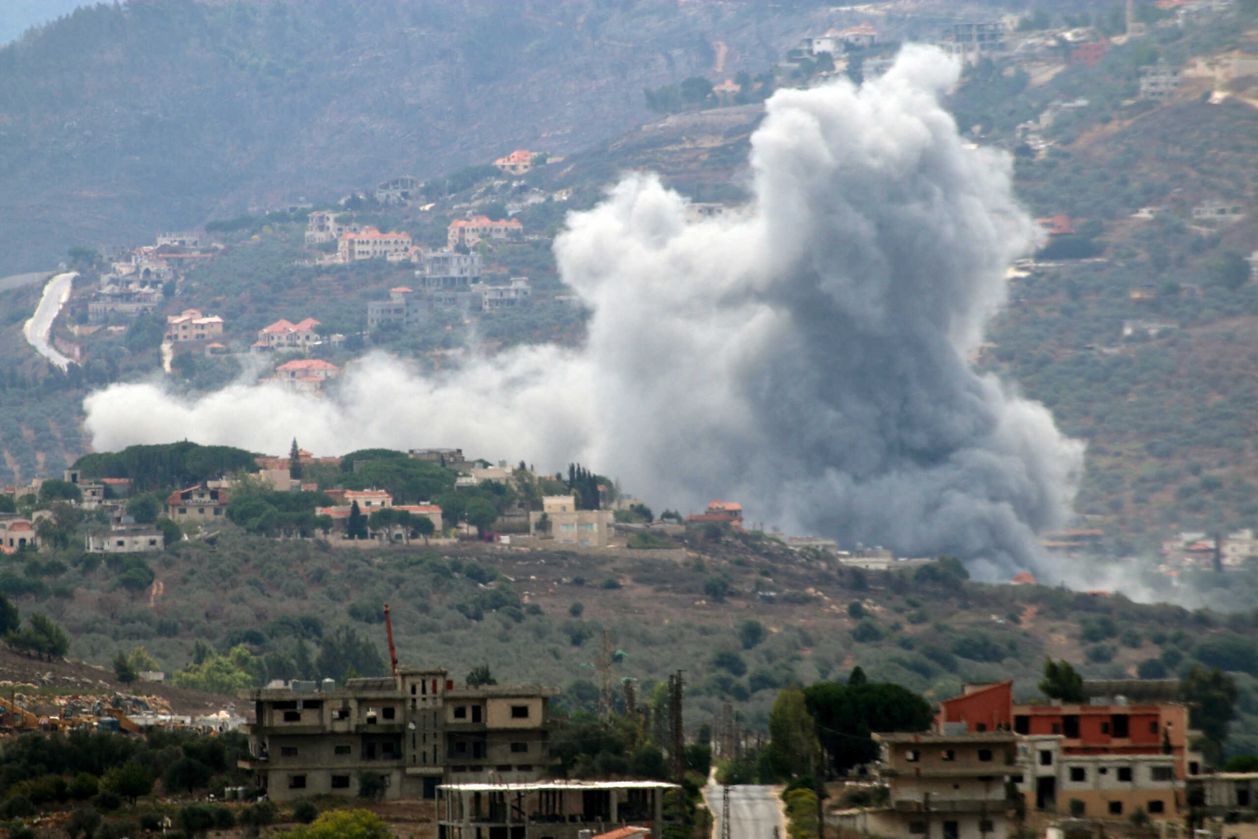 Smoke rises from the southern Lebanese village of Kfar Kila, amid ongoing cross-border hostilities between Hezbollah and Israeli forces, as pictured from Marjayoun, near the border with Israel, September 20, 2024. REUTERS
