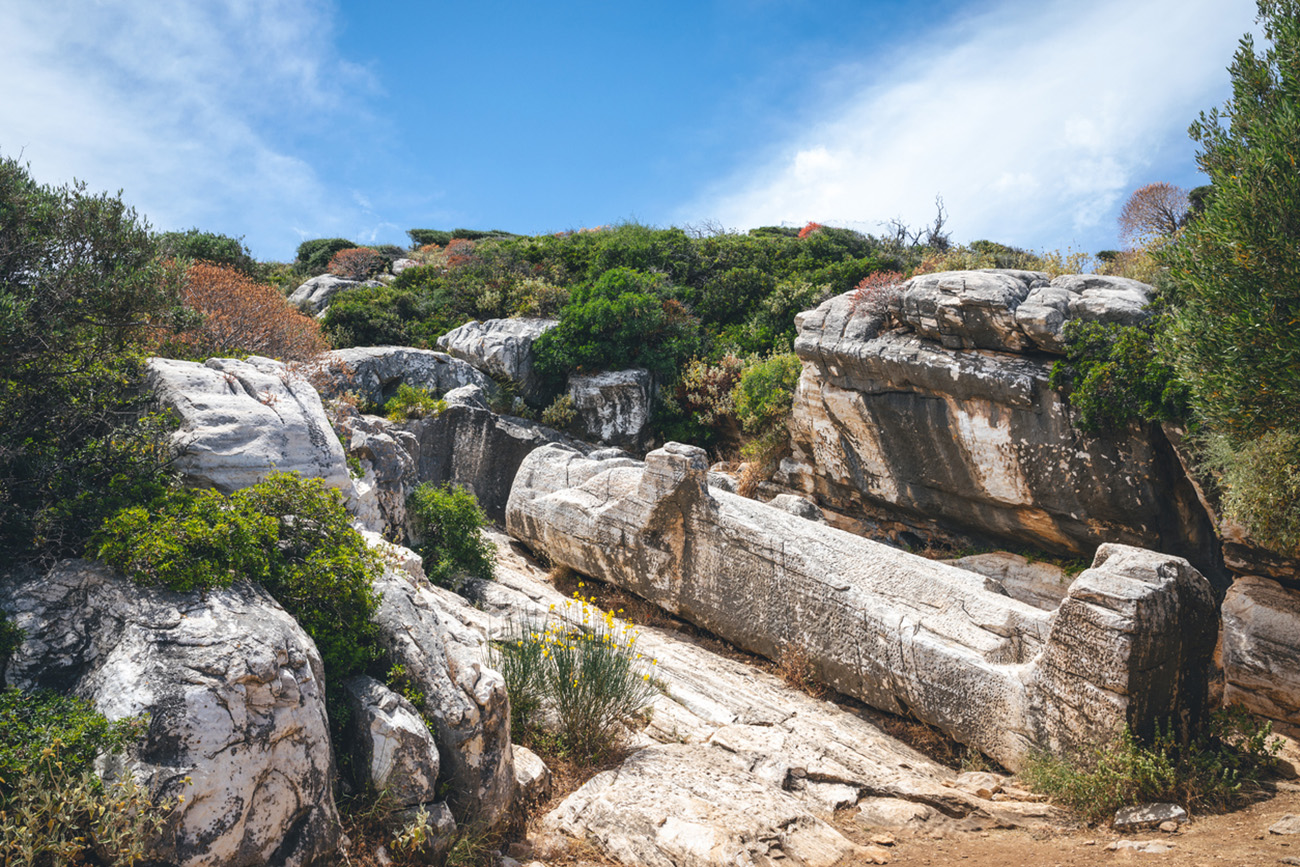 Unfinished statue Kouros of Apollonas (Colossus of Dionysus) in an ancient marble quarry near Apollonas (Naxos island, Greece).