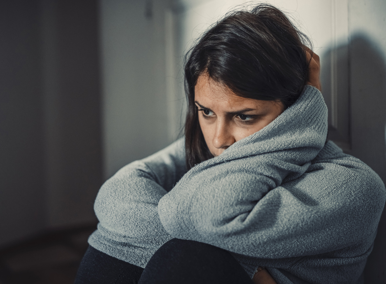 Close up of young woman struggling from mental breakdown
