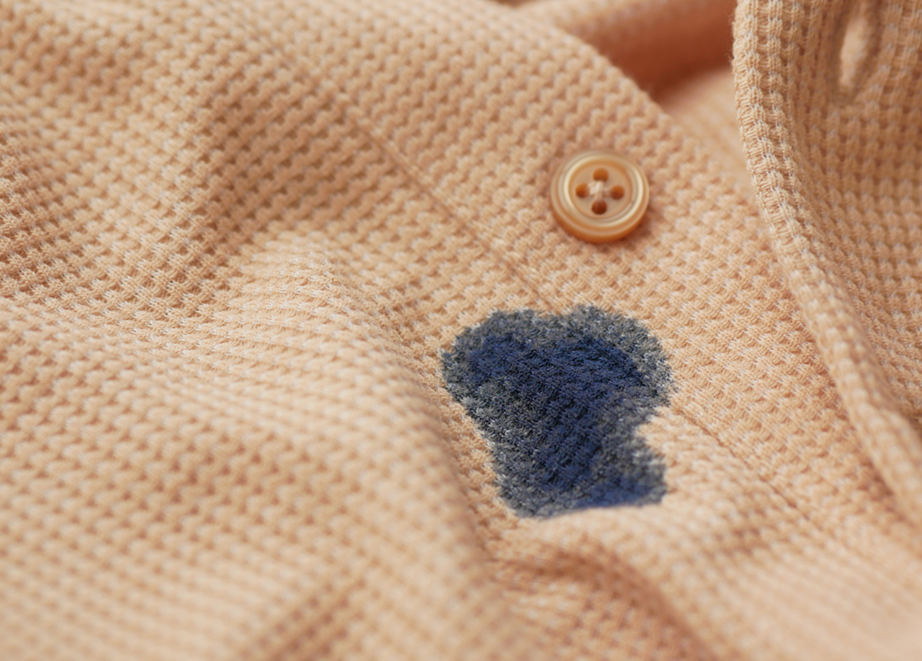 shirt with blue ink stain