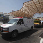 An Israeli ambulance carrying wounded people from a bombing in Bulgaria that killed seven people on Wednesday, July 18, 2012 leaves Ben Gurion airport in Tel Aviv, Israel, Thursday, July, 19, 2012. The bombing was the latest in a series of attacks attributed to Iran that have targeted Israelis and Jews overseas and threatened to escalate a shadow war between the two arch-enemies. (AP Photo