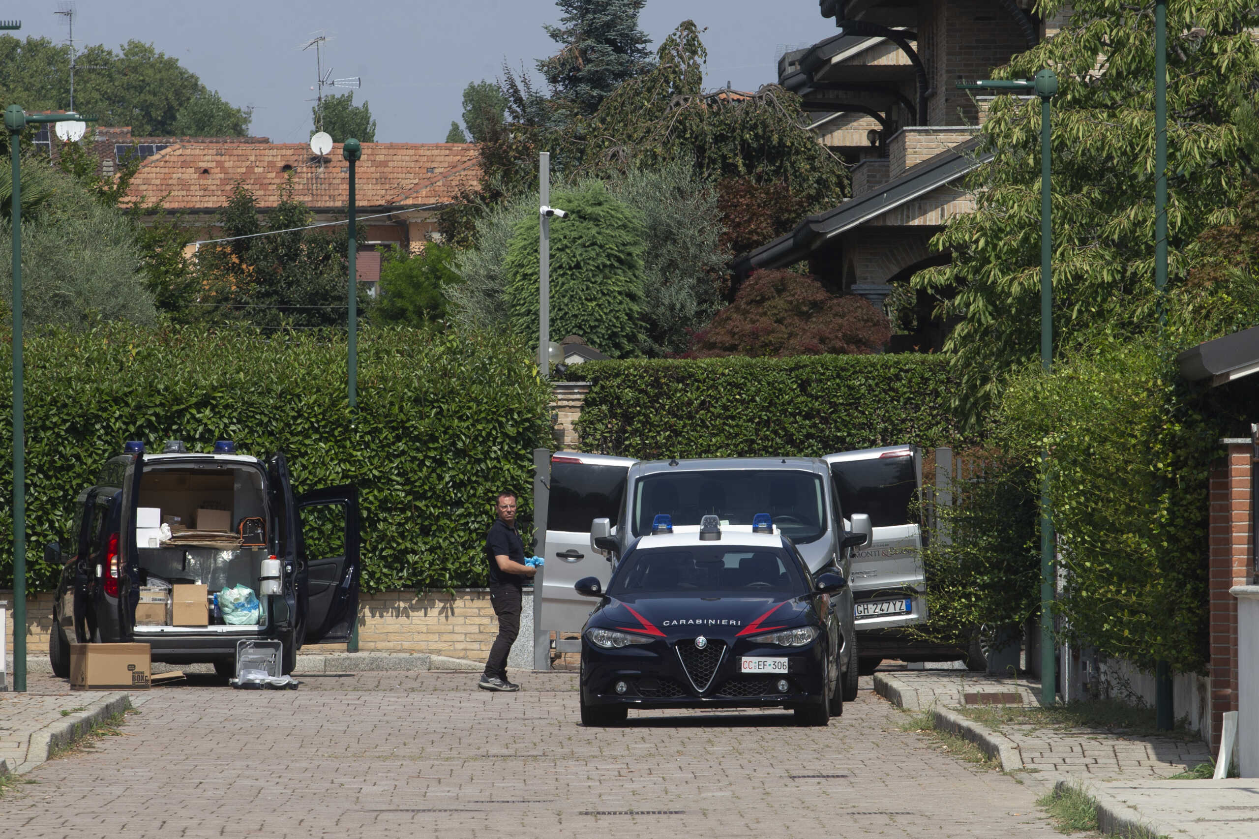 Forensic Police inspect the house where a 17-year-old boy killed his brother and parents in Paderno Dugnano near Milan, northern Italy, Sunday, Sept. 1, 2024. Italian prosecutors on Monday said a 17-year-old high school student who confessed to stabbing to death his 12-year-old brother and parents had been suffering a general sense of “malaise,” but has been unable to provide a motive for a triple homicide that has shocked Italians. (Marco Ottico