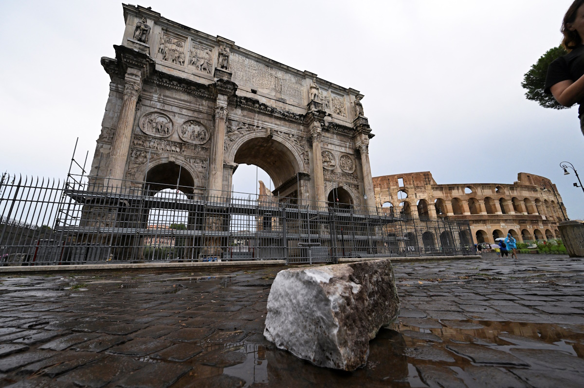 Fragments of Constantine's Arch lie on the ground after lightning struck it during a storm in Rome, Italy September 3, 2024. REUTERS