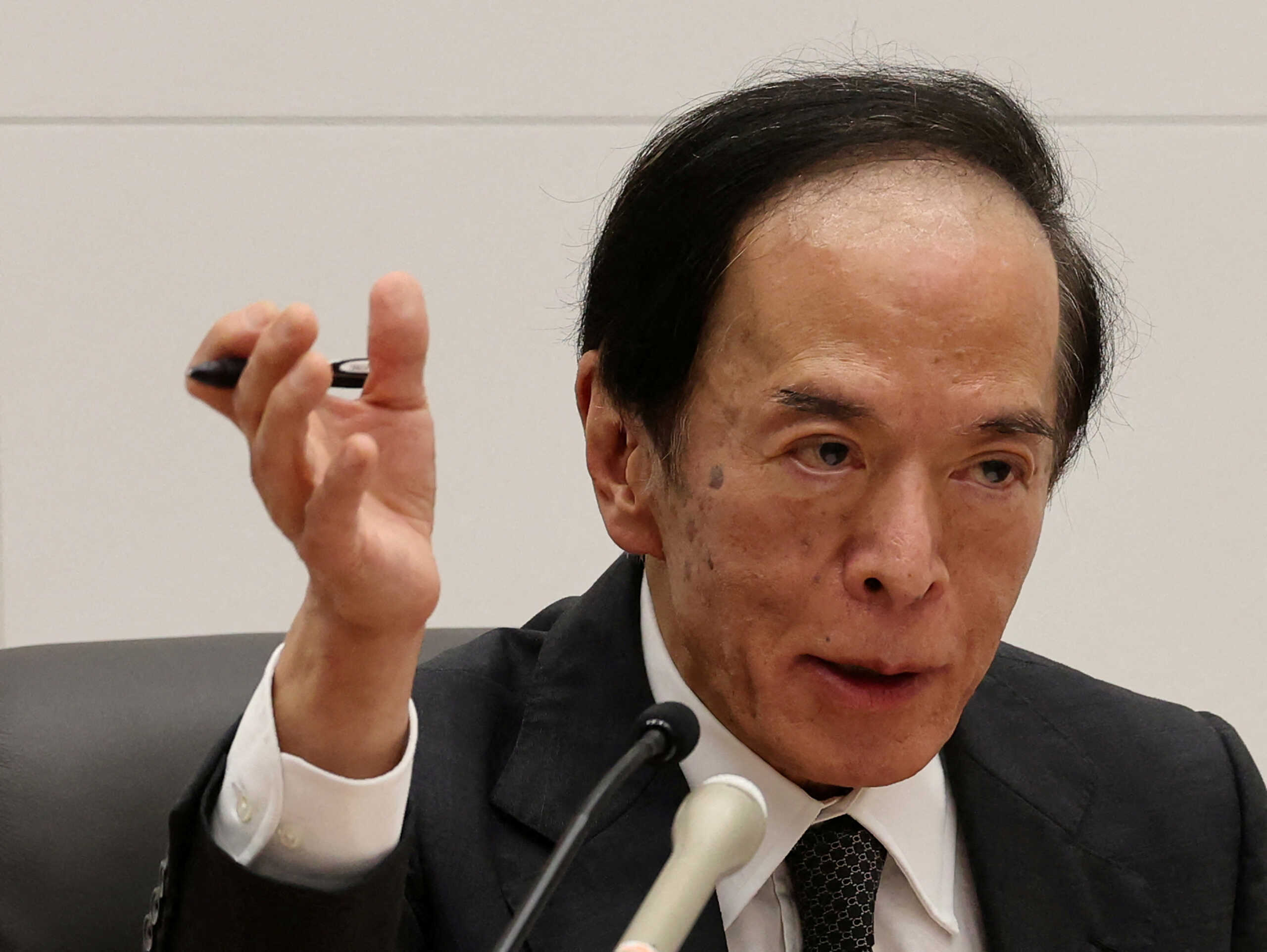 FILE PHOTO: Bank of Japan Governor Kazuo Ueda attends a press conference after its policy meeting in Tokyo, Japan June 14, 2024. REUTERS