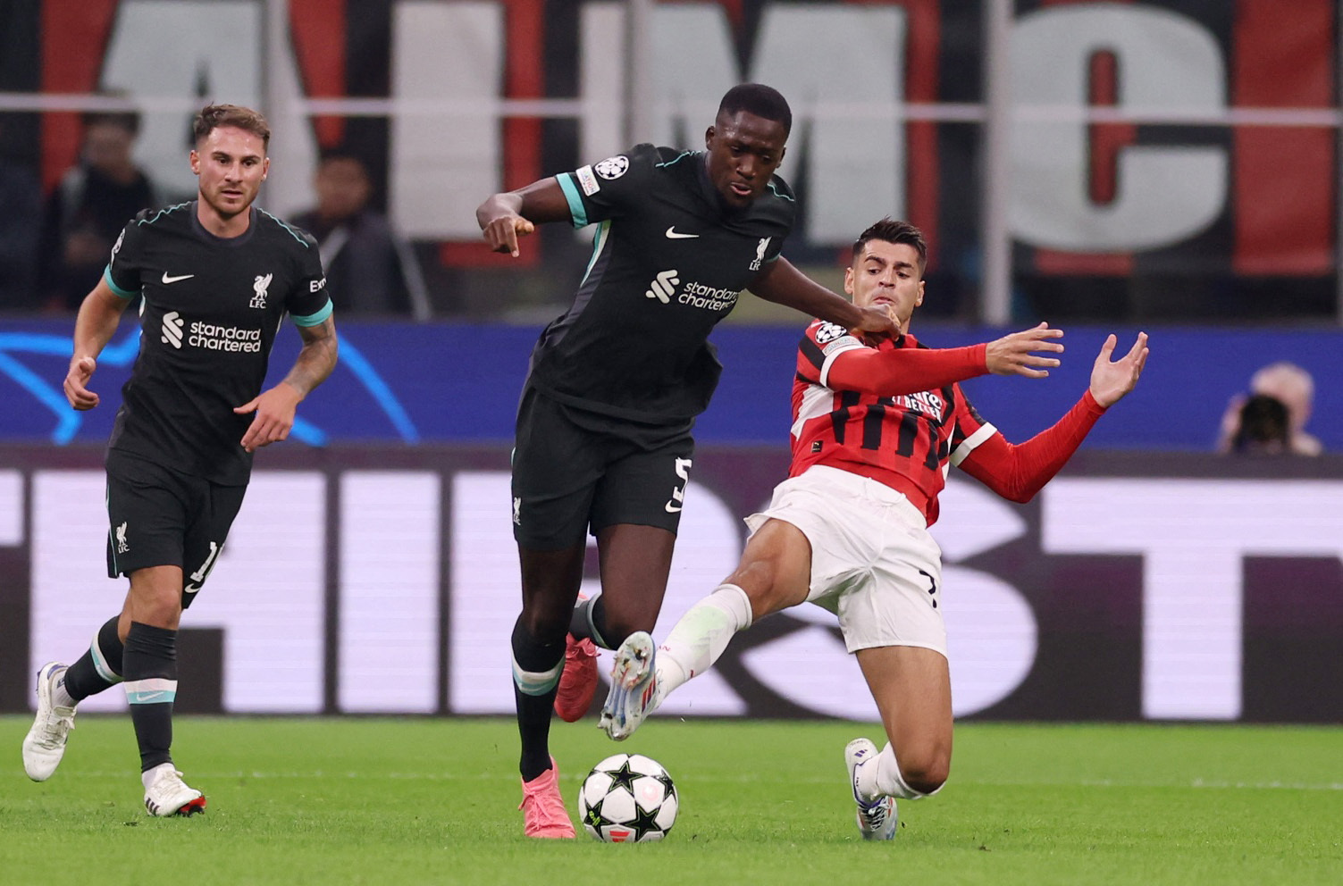Soccer Football - Champions League - AC Milan v Liverpool - San Siro, Milan, Italy - September 17, 2024 Liverpool's Ibrahima Konate in action with AC Milan's Alvaro Morata REUTERS