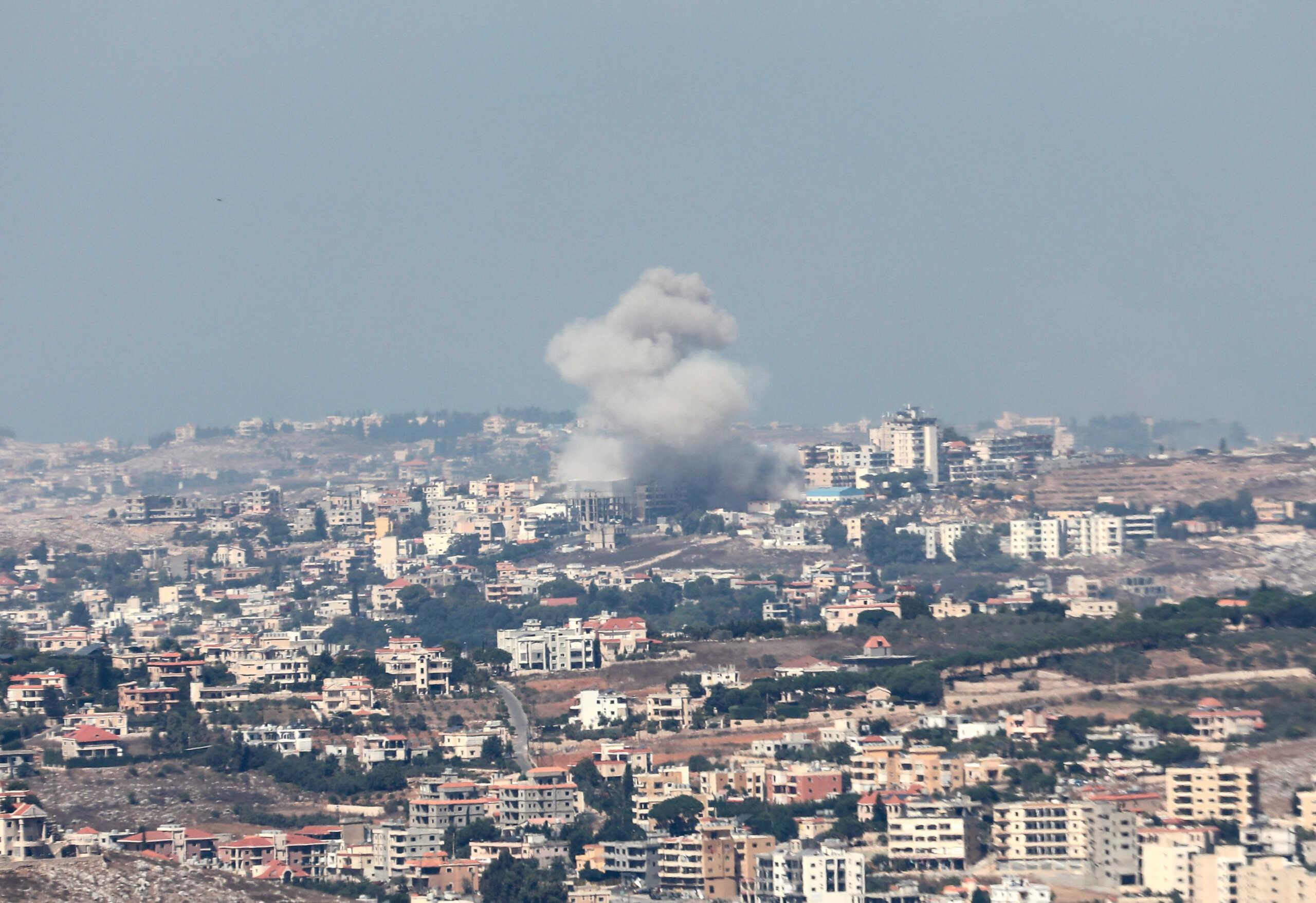 Smoke billows over southern Lebanon, amid ongoing cross-border hostilities between Hezbollah and Israeli forces, as seen from Marjayoun, near the border with Israel, September 25, 2024. REUTERS
