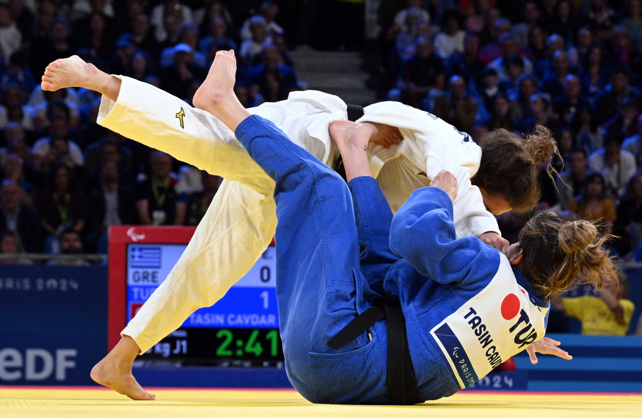 Paris 2024 Paralympics - Judo -  Women -48 kg J1 Bronze Medal Contest B - Champ de Mars Arena, Paris, France - September 5, 2024 Emmanouela Masourou of Greece and Ecem Tasin Cavdar of Turkey in action REUTERS