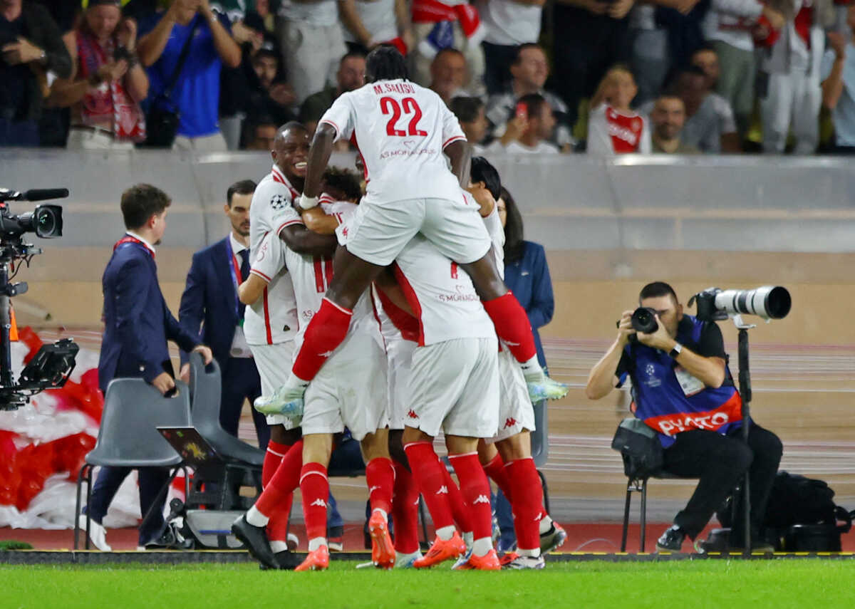 Soccer Football - Champions League - AS Monaco v FC Barcelona - Stade Louis II, Monaco - September 19, 2024 AS Monaco's Maghnes Akliouche celebrates scoring their first goal with teammates REUTERS