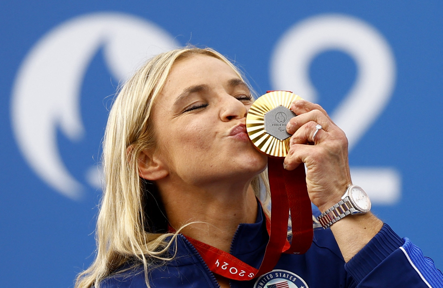 Paris 2024 Paralympics - Road Cycling - Women's H5 Road Race Victory Ceremony - Clichy-sous-Bois, France - September 5, 2024. Gold medallist Oksana Masters of United States celebrates on the podium REUTERS