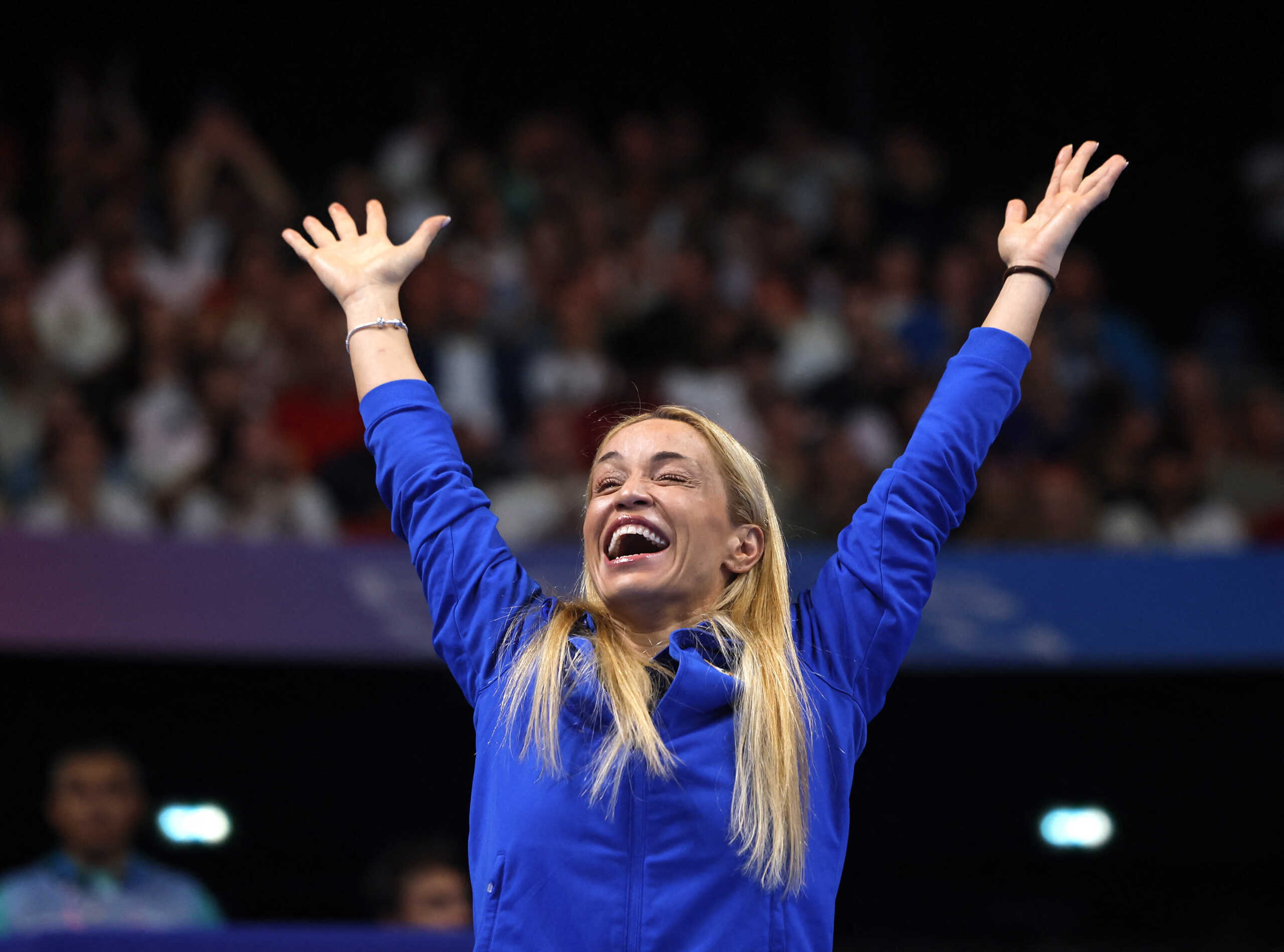 Paris 2024 Paralympics - Swimming -  Women's 100m Breaststroke - SB11 Final - Paris La Defense Arena, Nanterre, France - September 5, 2024  Bronze medallist Karolina Pelendritou of Cyprus celebrates after the final REUTERS