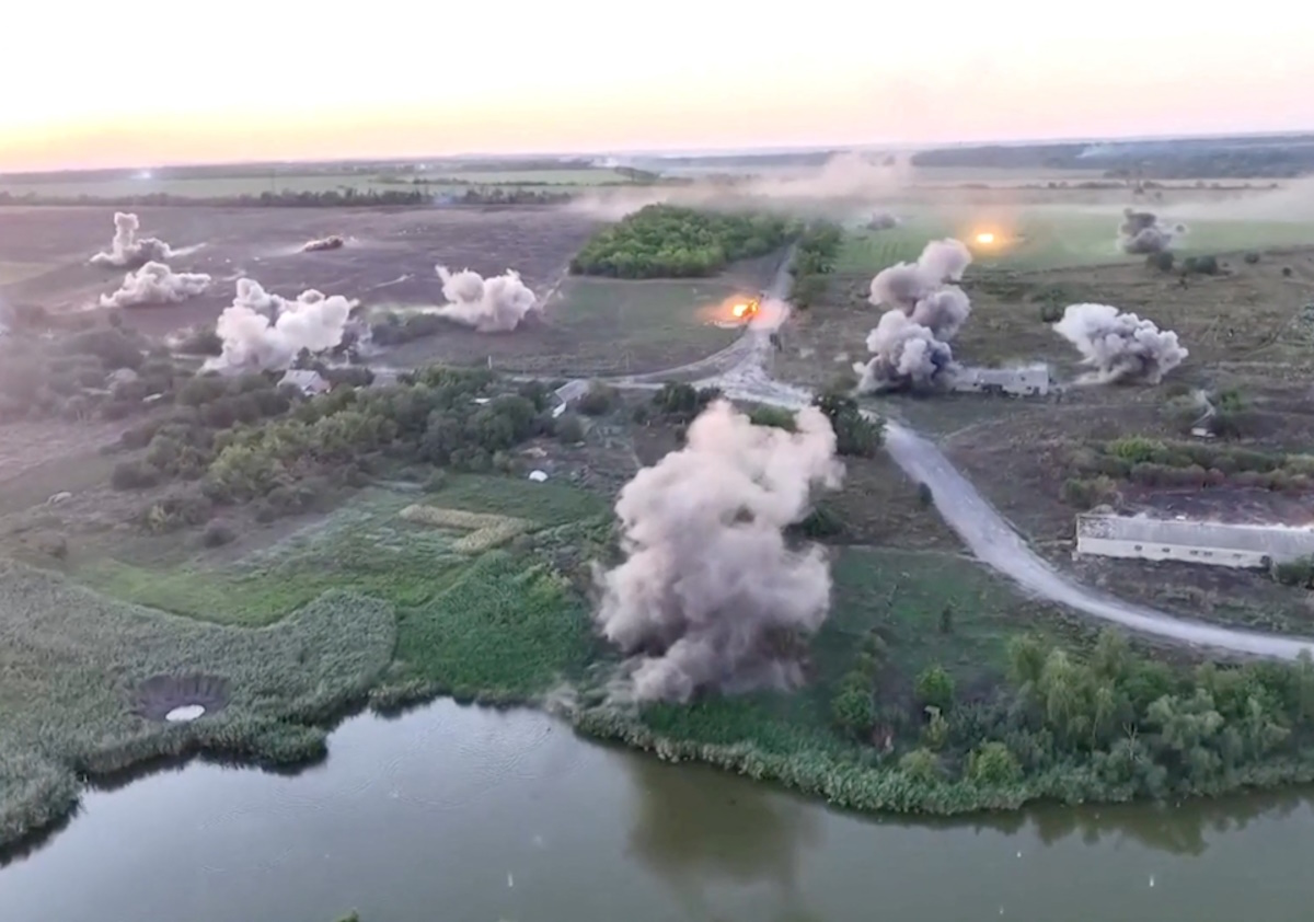A drone view shows what the 68th Separate Jaeger Brigade 'Oleksy Dovbusha' says are multiple launch rocket system strikes on Russian troops, in Novozhelanne, Donetsk Region, Ukraine, in this still image from handout video obtained on August 21, 2024.   Reuters TV