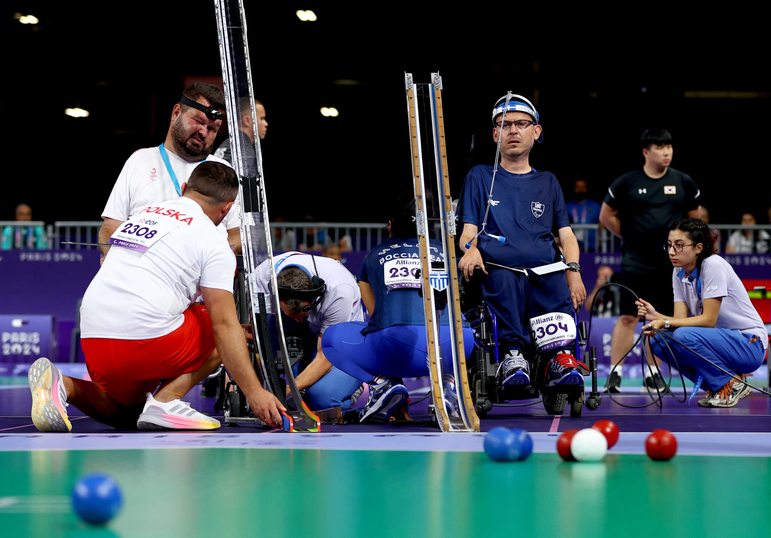 Paris 2024 Paralympics - Boccia - Men's Individual - BC3 Bronze Medal Match - South Paris Arena 1, Paris, France - September 1, 2024 Damian Iskrzycki of Poland and Grigorios Polychronidis of Greece react during their bronze medal match REUTERS