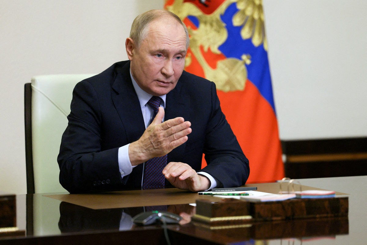 FILE PHOTO: Russian President Vladimir Putin chairs a meeting with members of the Security Council via video link at the Novo-Ogaryovo state residence outside Moscow, Russia August 23, 2024. Sputnik