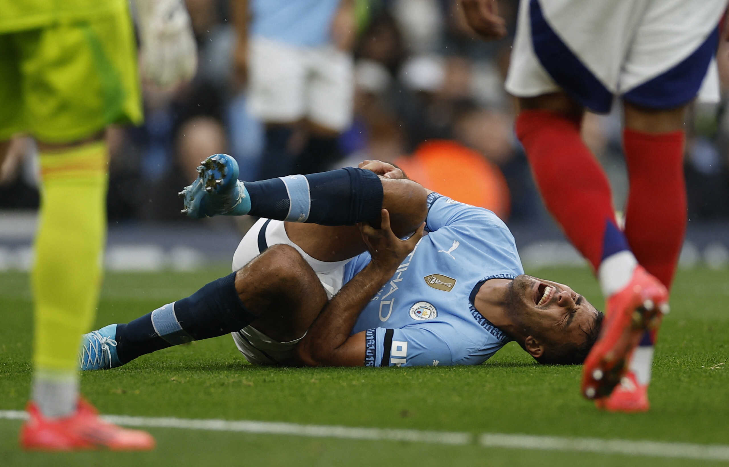 Soccer Football - Premier League - Manchester City v Arsenal - Etihad Stadium, Manchester, Britain - September 22, 2024 Manchester City's Rodri reacts after sustaining an injury Action Images via Reuters