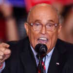 Former mayor of New York City and former Trump lawyer Rudy Giuliani speaks at the Nassau Veterans Memorial Coliseum during a rally held by Republican presidential nominees and former U.S. President Donald Trump, in Uniondale, New York, U.S., September 18, 2024. REUTERS