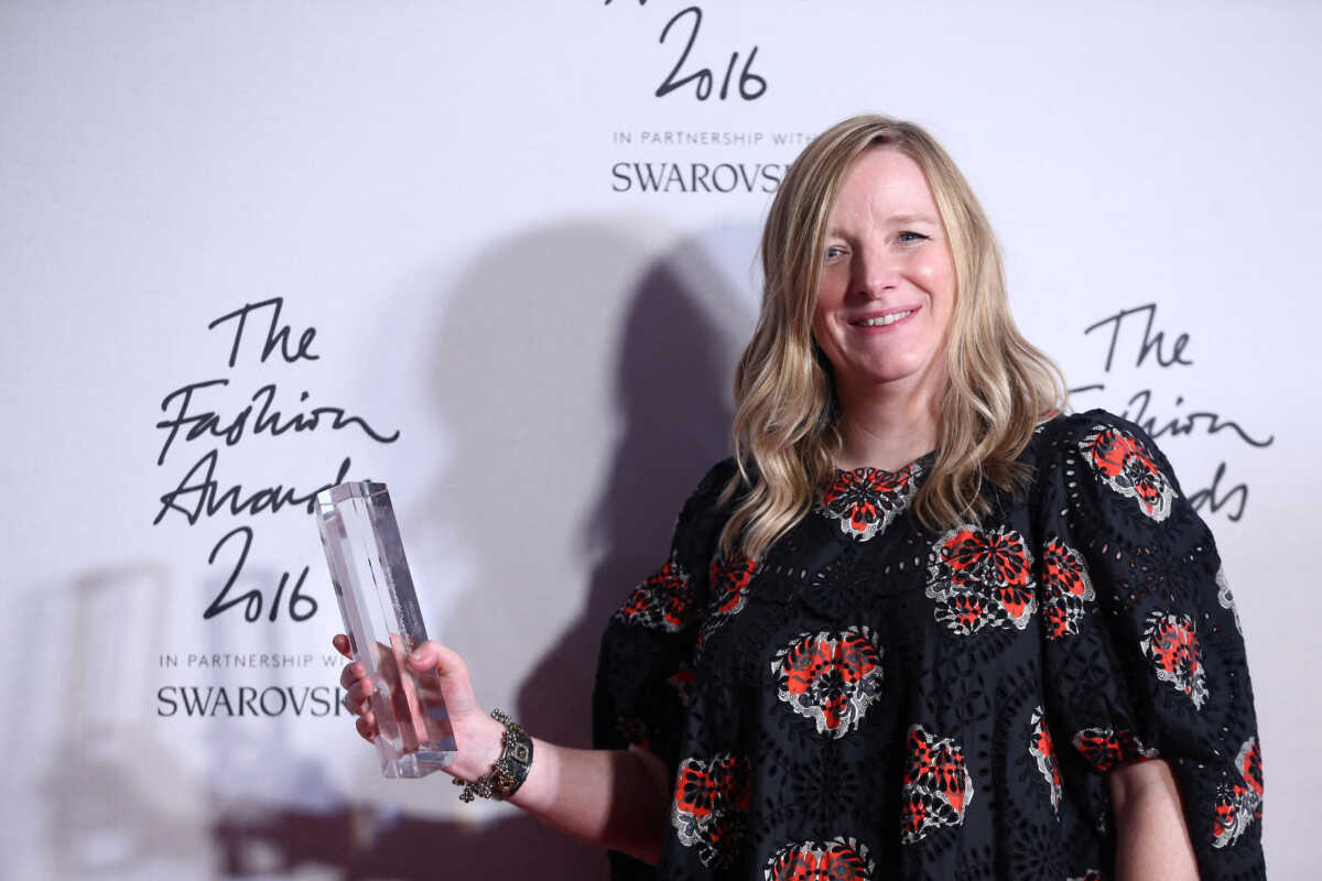 FILE PHOTO: Sarah Burton holds the British Brand award on behalf of McQueen at the Fashion Awards 2016 in London, Britain December 5, 2016. REUTERS