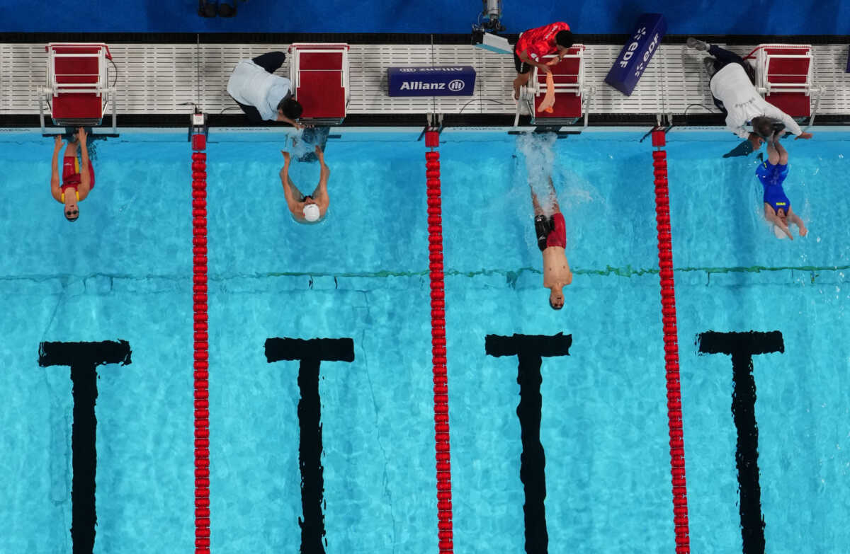 Paris 2024 Paralympics - Swimming - Mixed 4x50m Medley Relay - 20 Points Heats - SB13 Heats - Paris La Defense Arena, Nanterre, France - September 5, 2024 Beatriz Lerida Maldonado of Spain, Liankang Zou of China, Kaede Hinata of Japan and Alexandra Stamatopoulou of Greecein action REUTERS