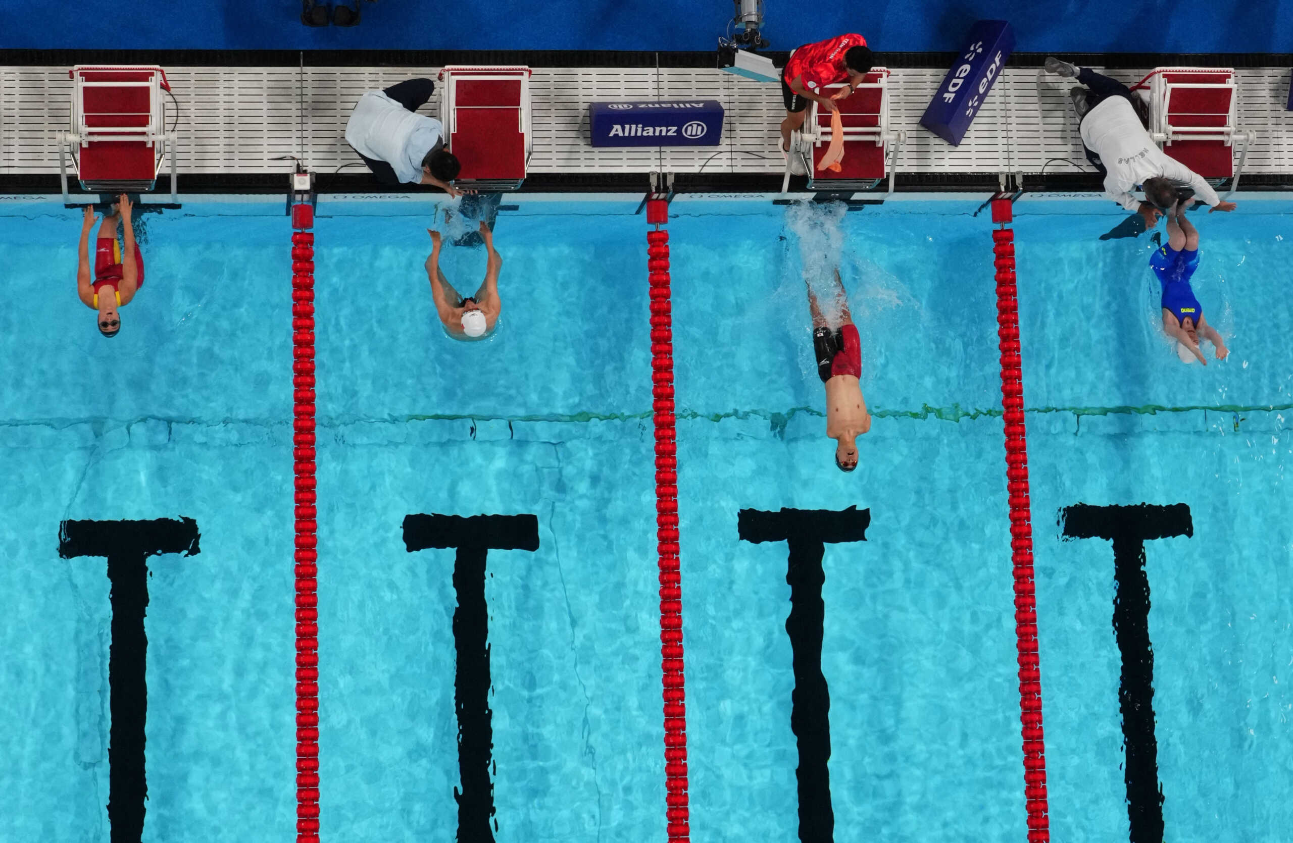 Paris 2024 Paralympics - Swimming - Mixed 4x50m Medley Relay - 20 Points Heats - SB13 Heats - Paris La Defense Arena, Nanterre, France - September 5, 2024 Beatriz Lerida Maldonado of Spain, Liankang Zou of China, Kaede Hinata of Japan and Alexandra Stamatopoulou of Greecein action REUTERS