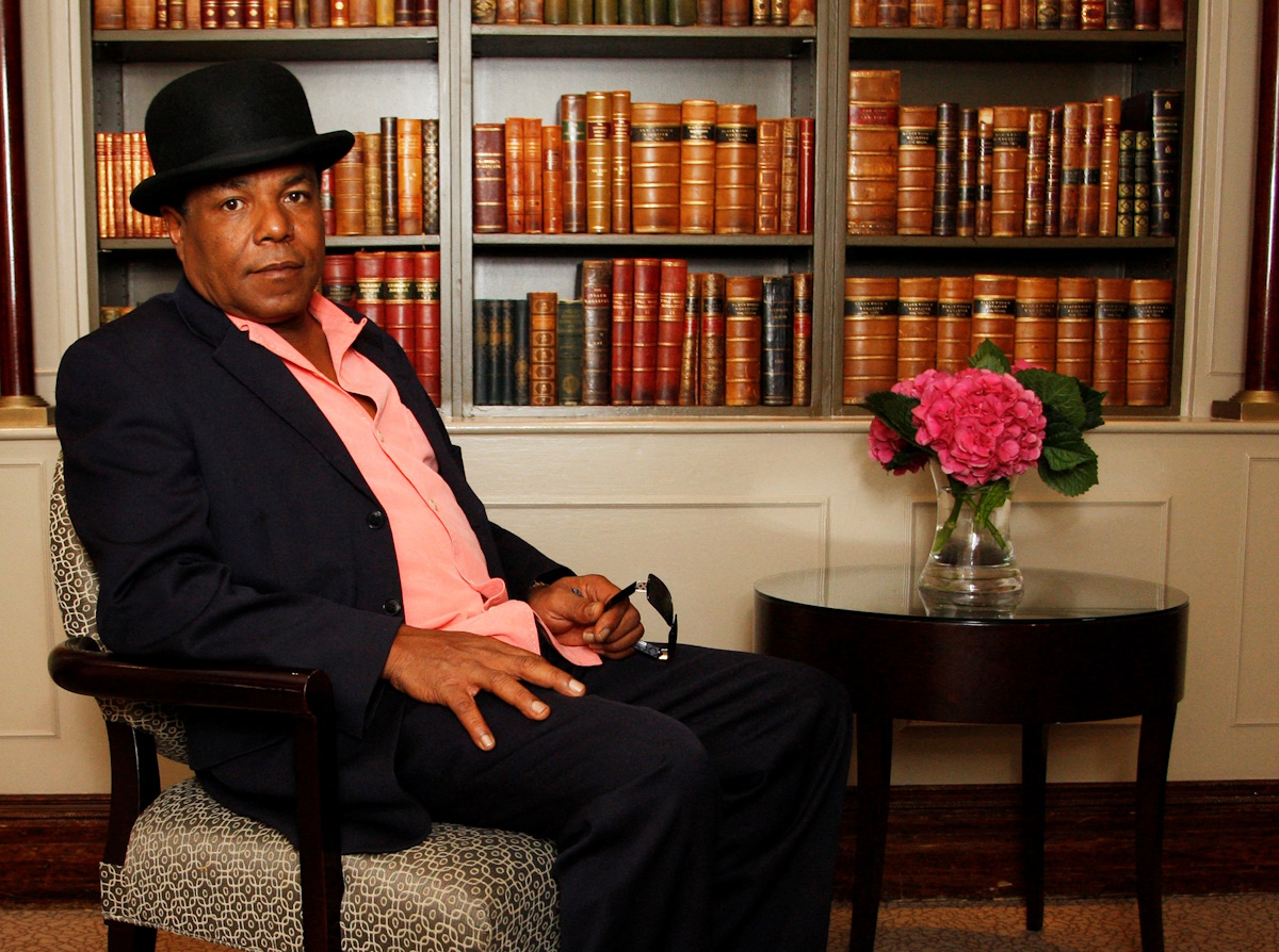FILE PHOTO: Tito Jackson, brother of singer Michael Jackson who died after an overdose in August, poses for pictures at the Churchill Hyatt Regency Hotel in London, Britain, September 17, 2009. REUTERS
