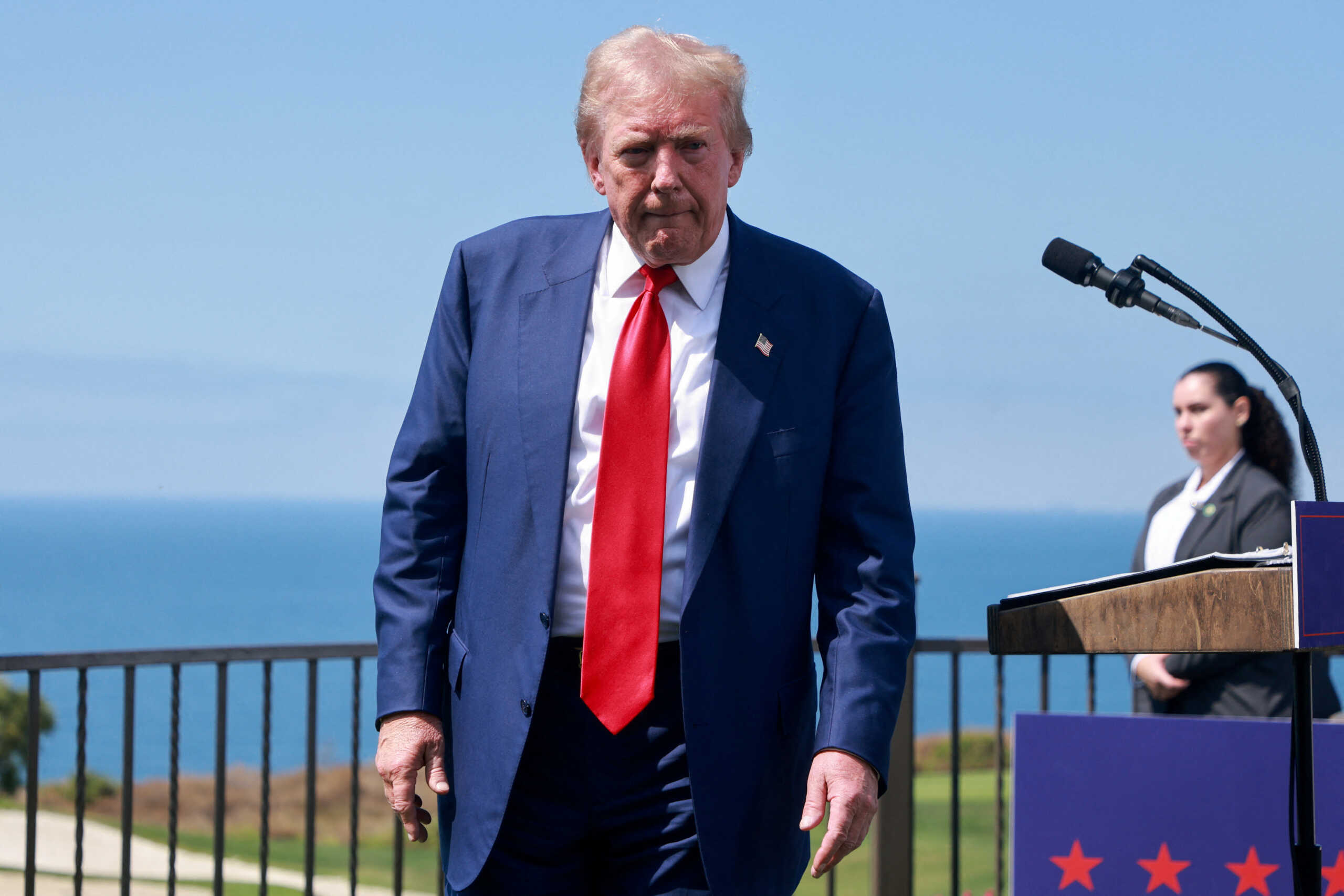 Republican presidential nominee and former U.S. President Donald Trump walks on the day he attends a press conference at Trump National Golf Club, in Rancho Palos Verdes, U.S., September 13, 2024. REUTERS