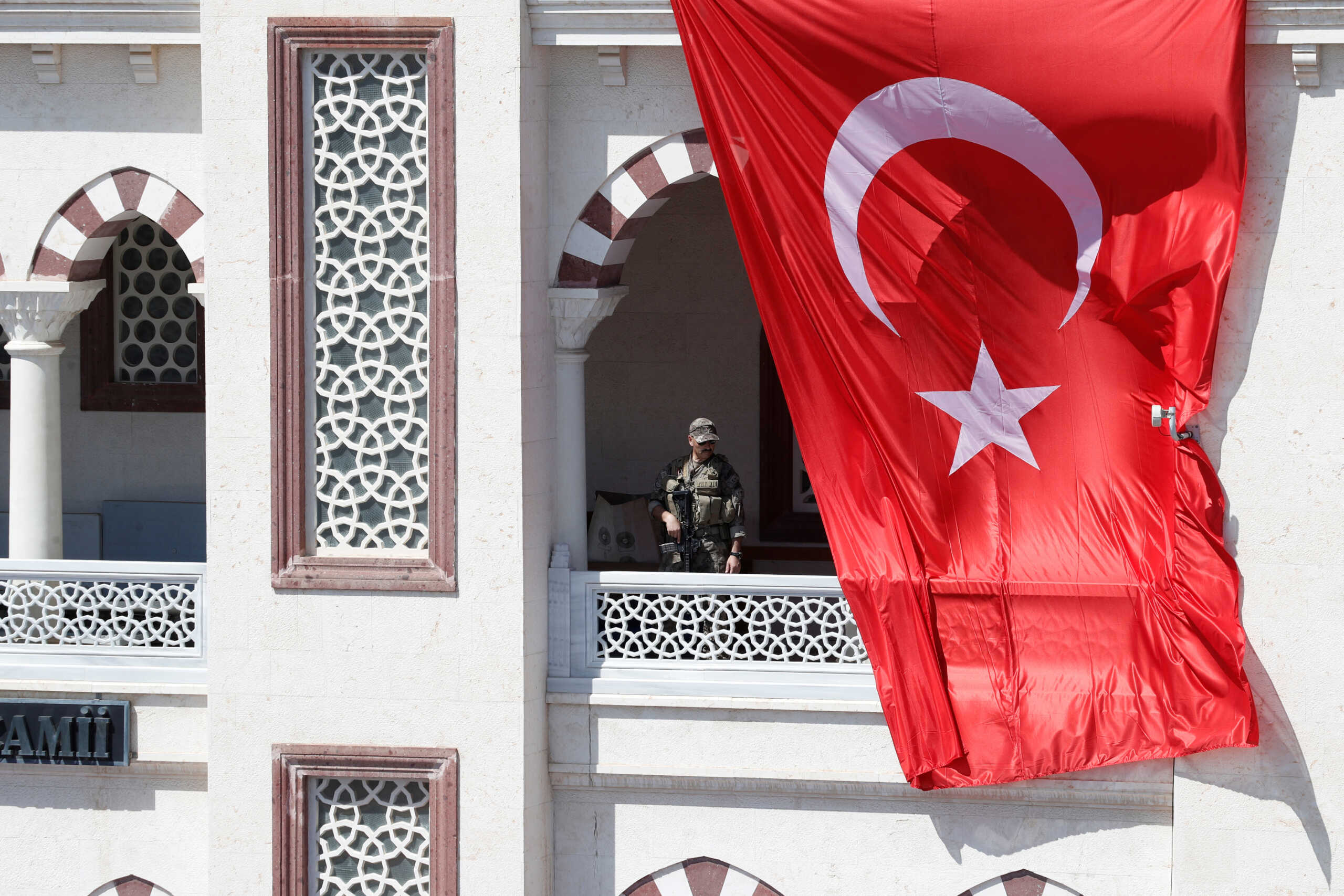 A member of Turkish police special forces stands guard during the funeral ceremony of Aysenur Ezgi Eygi, a Turkish-American activist killed in the Israeli-occupied West Bank, in Didim, in the western Aydin province, Turkey, September 14, 2024. REUTERS
