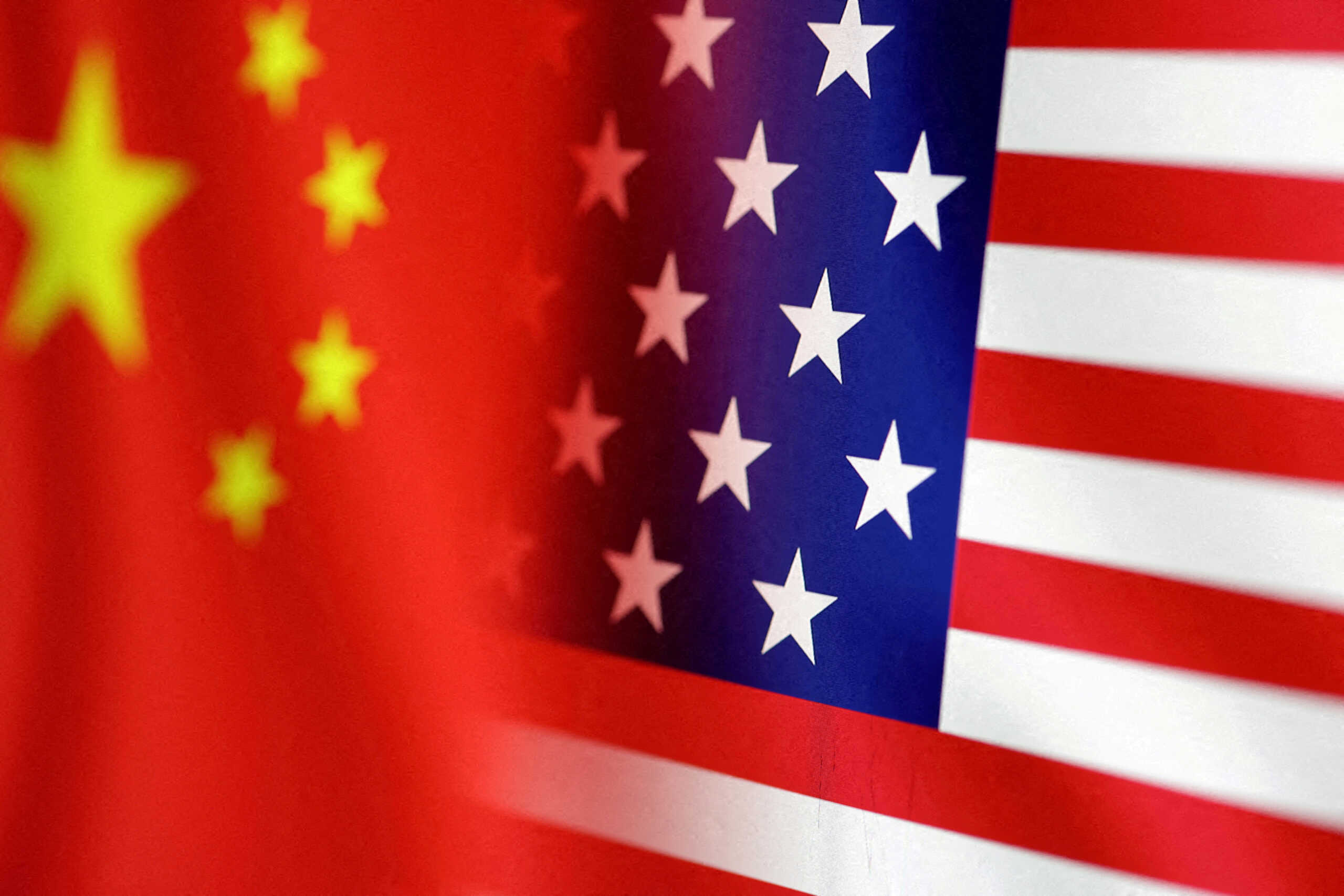 FILE PHOTO: U.S. and Chinese flags are seen in this illustration, taken January 30, 2023. REUTERS