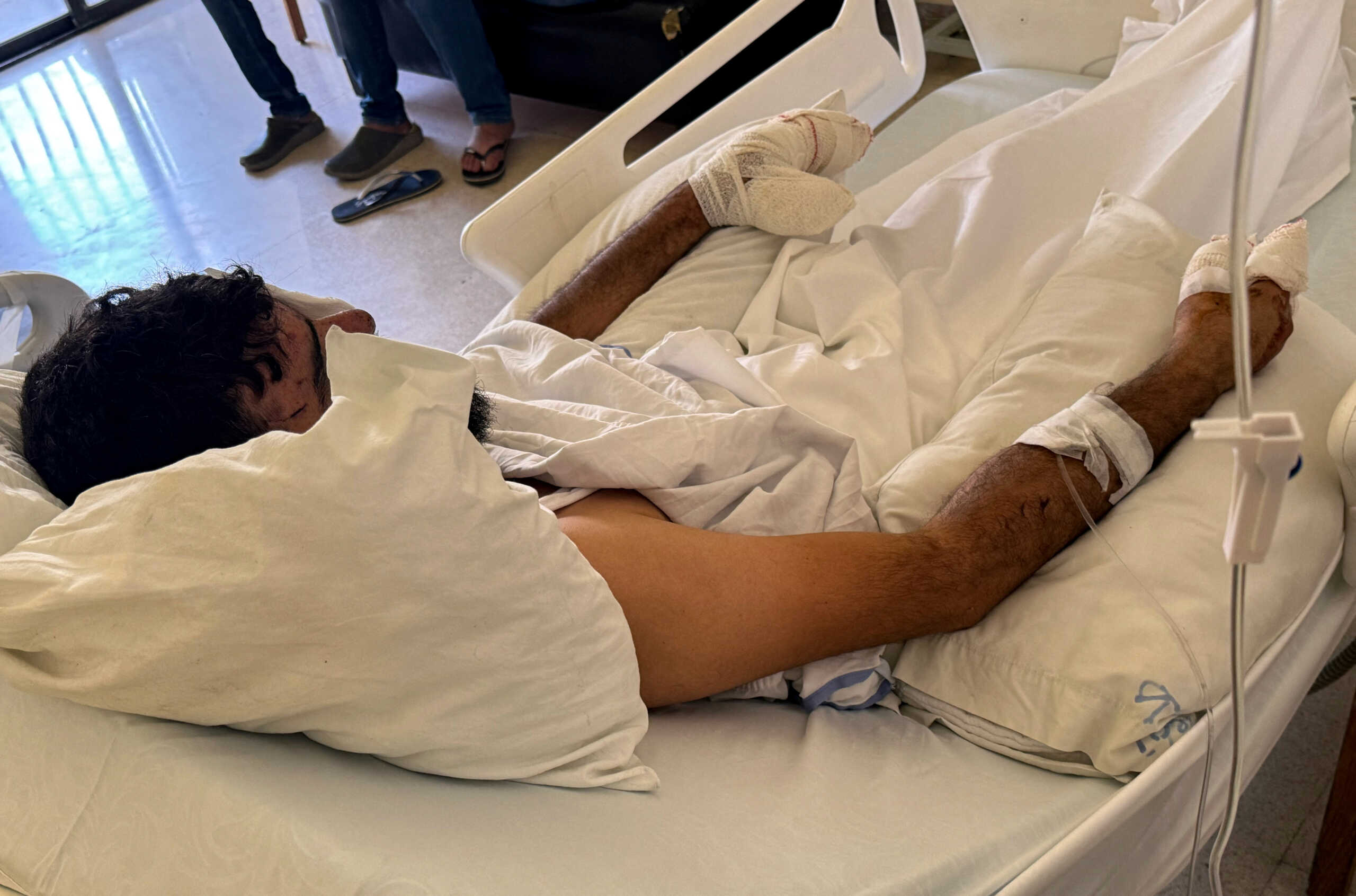 A man, who was wounded when pagers used by Hezbollah detonated on Tuesday across Lebanon, receives treatment at Sidon Governmental Hospital, in Sidon, Lebanon September 20, 2024. REUTERS