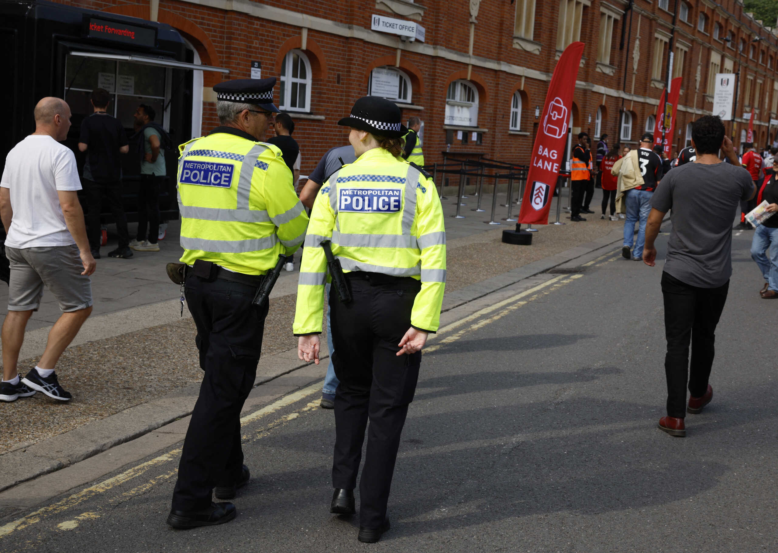 Soccer Football - Premier League - Fulham v Newcastle United - Craven Cottage, London, Britain - September 21, 2024 Police officers are seen outside the stadium before the match Action Images via Reuters