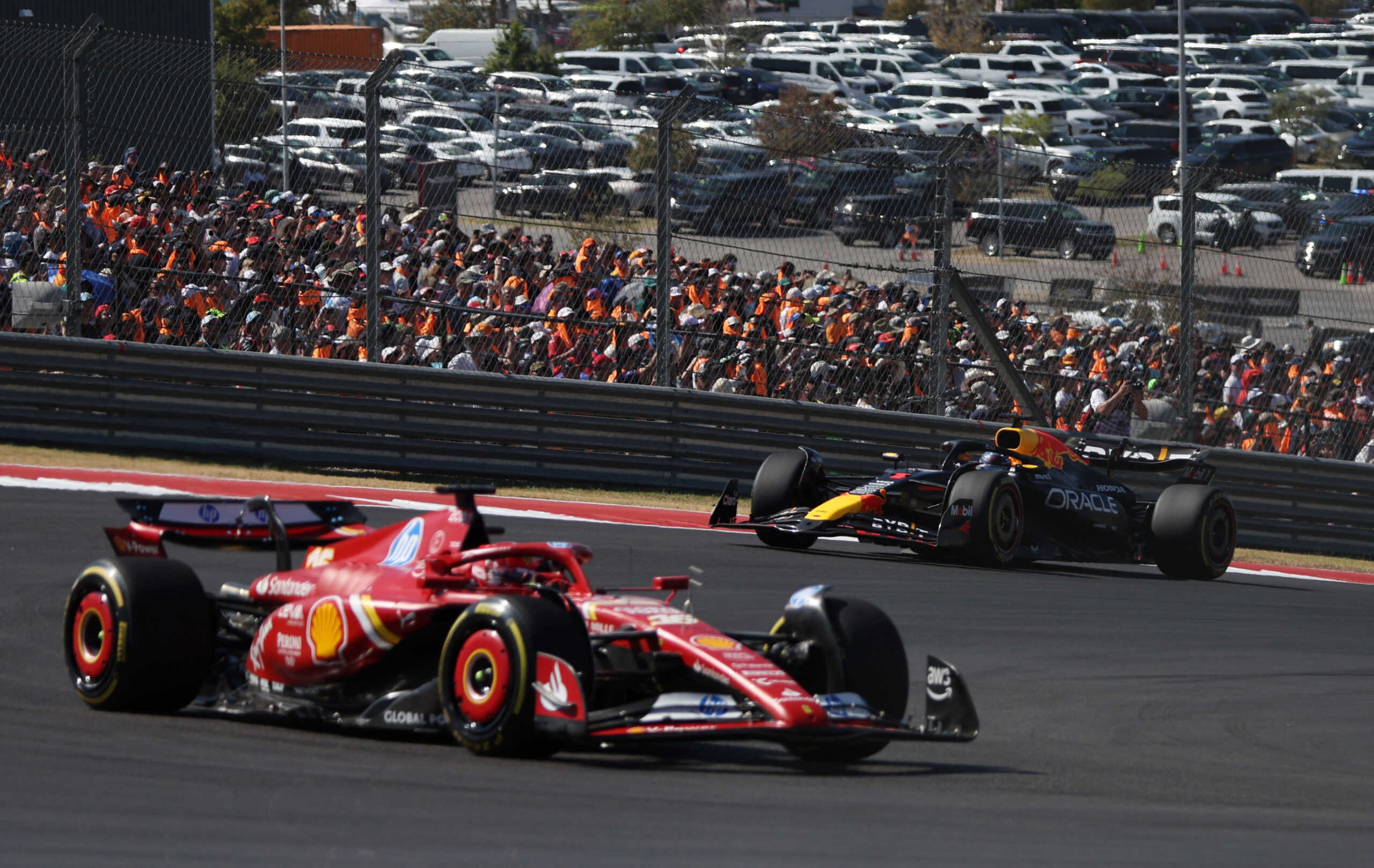 Formula One F1 - United States Grand Prix - Circuit of the Americas, Austin, Texas, United States - October 20, 2024 Red Bull's Max Verstappen and Ferrari's Charles Leclerc in action during the race REUTERS
