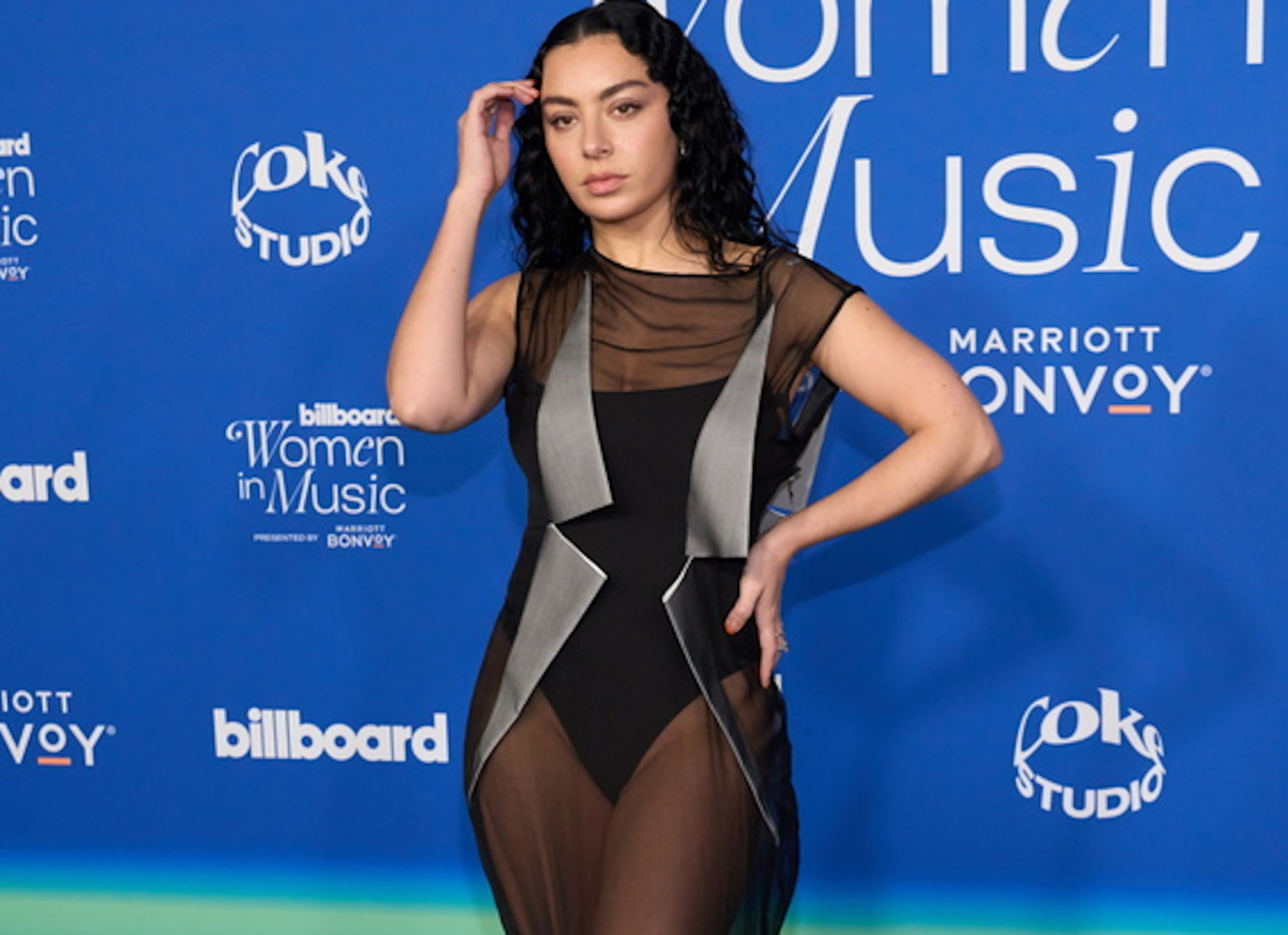 epa11203432 English singer-songwriter Charli XCX arrives to the 2024 Billboard Women in Music Awards at the YouTube Theater in Los Angeles, California, USA, 06 March 2024.  EPA