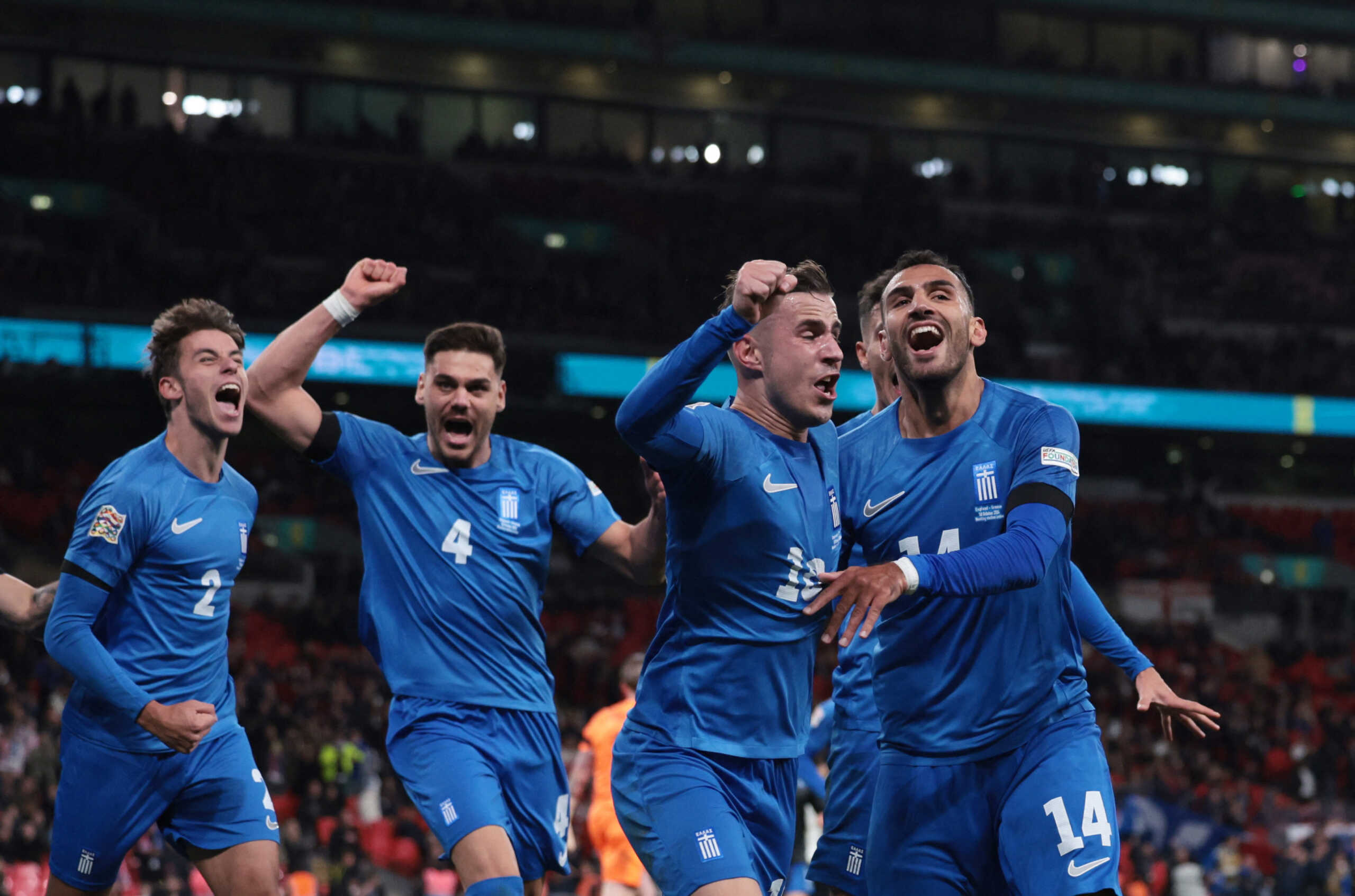 Soccer Football - UEFA Nations League - Group B2 - England v Greece - Wembley Stadium, London, Britain - October 10, 2024 Greece's Vangelis Pavlidis celebrates scoring their second goal with teammates Action Images via Reuters