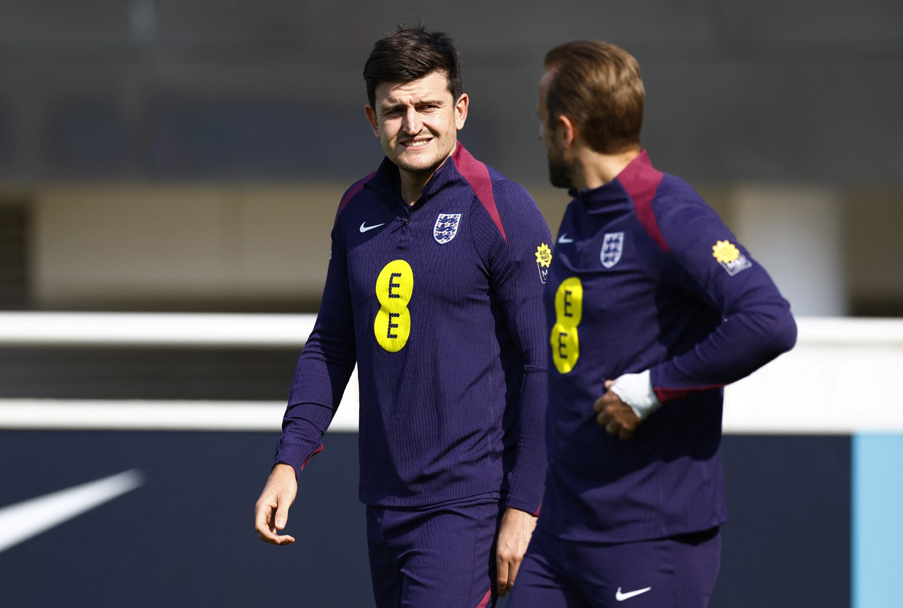 Soccer Football - Nations League - England Training - St George's Park, Burton upon Trent, Britain - September 6, 2024 England's Harry Maguire with Harry Kane during training Action Images via Reuters