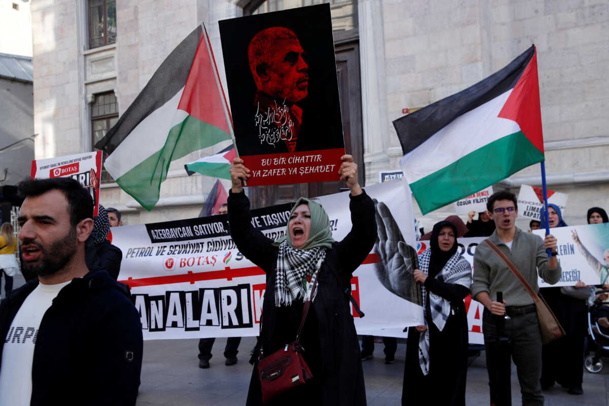 Pro-Palestinian demonstrators shout slogans during a protest condemning the killing of Hamas leader Yahya Sinwar, in Istanbul, Turkey, October 20, 2024. REUTERS